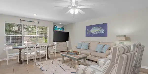 Image 4: hidden-dunes-cottage-living-room-with-tv