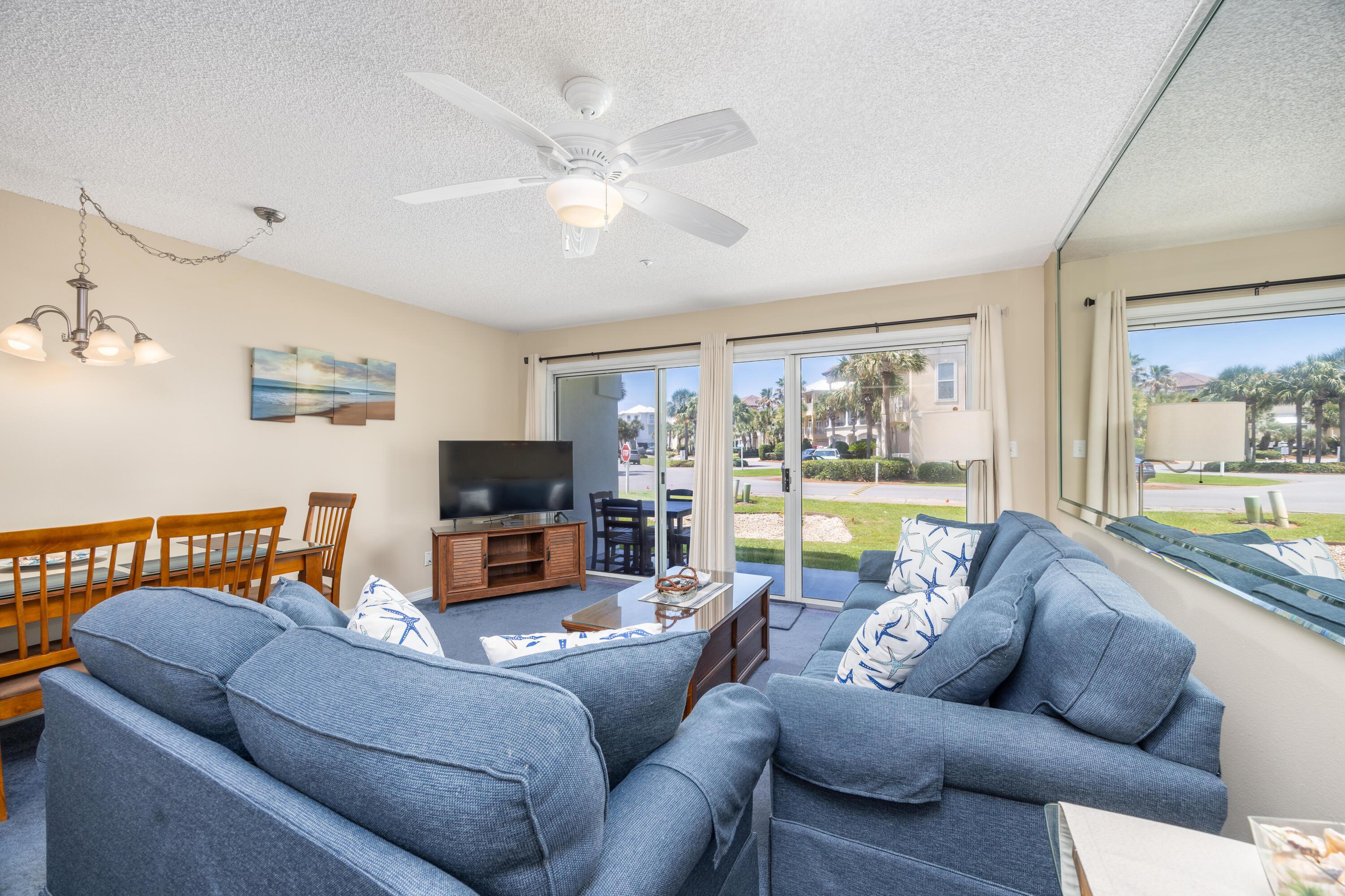 Image 3: Living Area with Patio Access