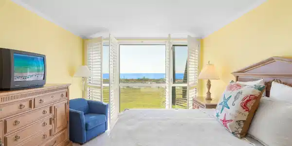 Image 4: Master Bedroom with Wide Windows