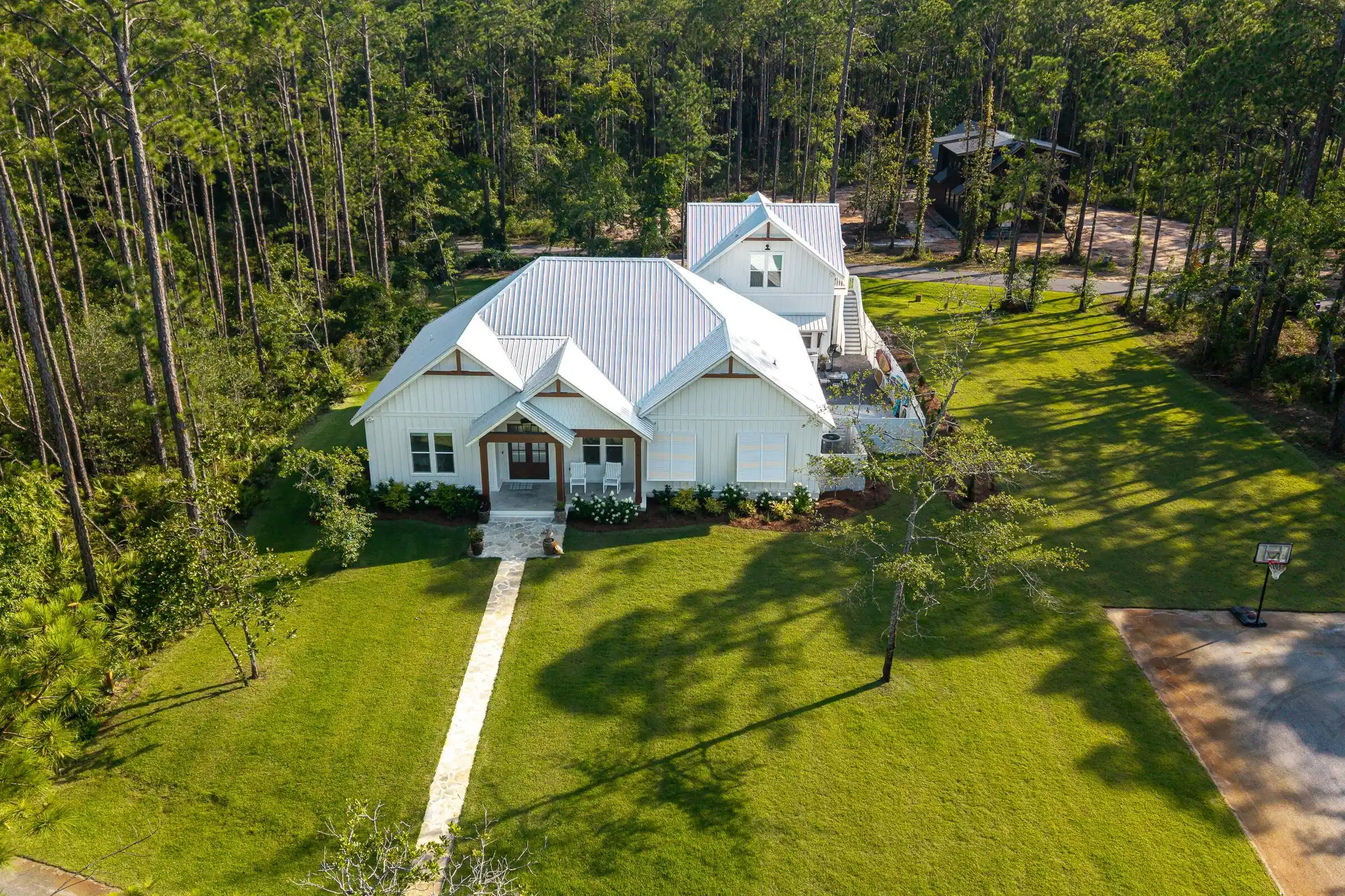 Image 1: Aerial of Front of Home