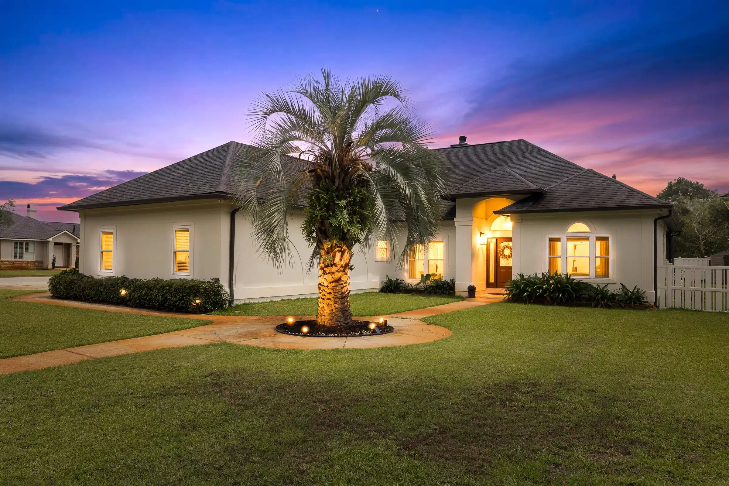 Image 1: Welcome home. As the sun sets, this beau