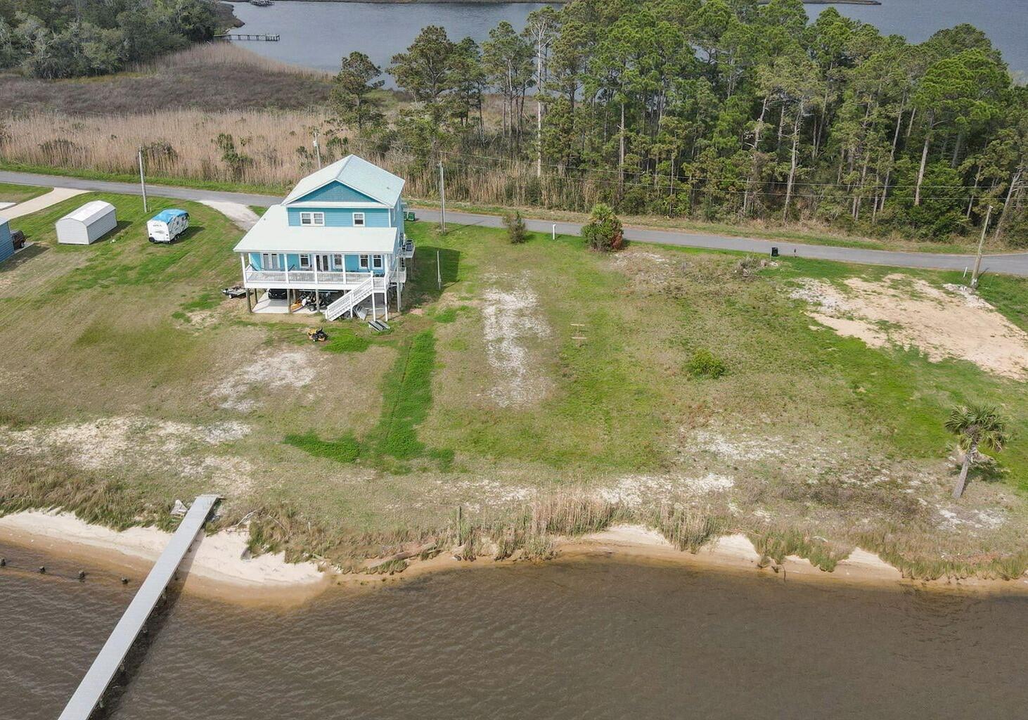 Image 3: View of Lot M at 554 Beatrice Pt to righ