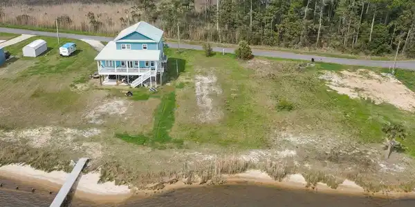 Image 3: View of Lot M at 554 Beatrice Pt to righ