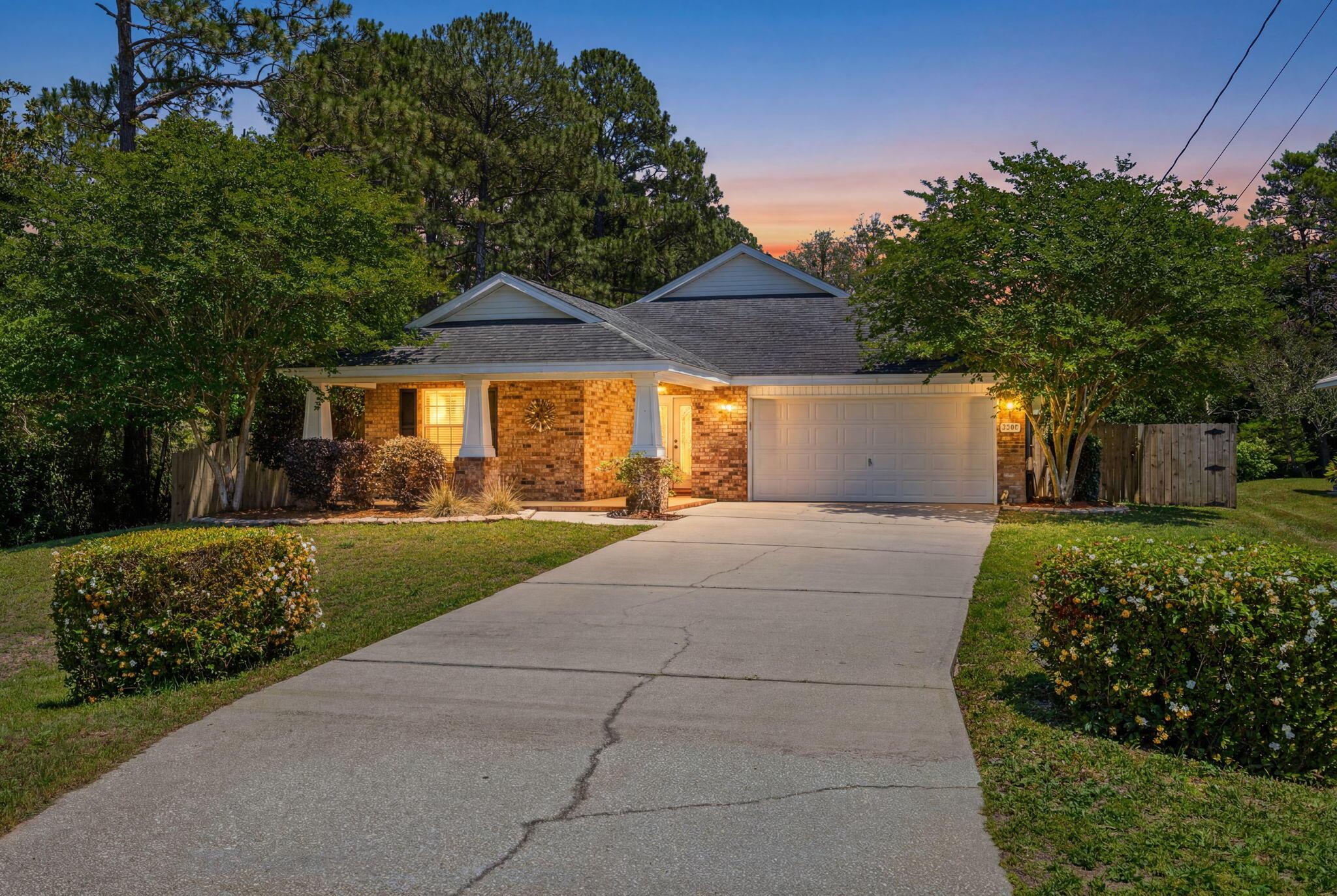 Image 2: 1-web-or-mls-1. frontyard twilight