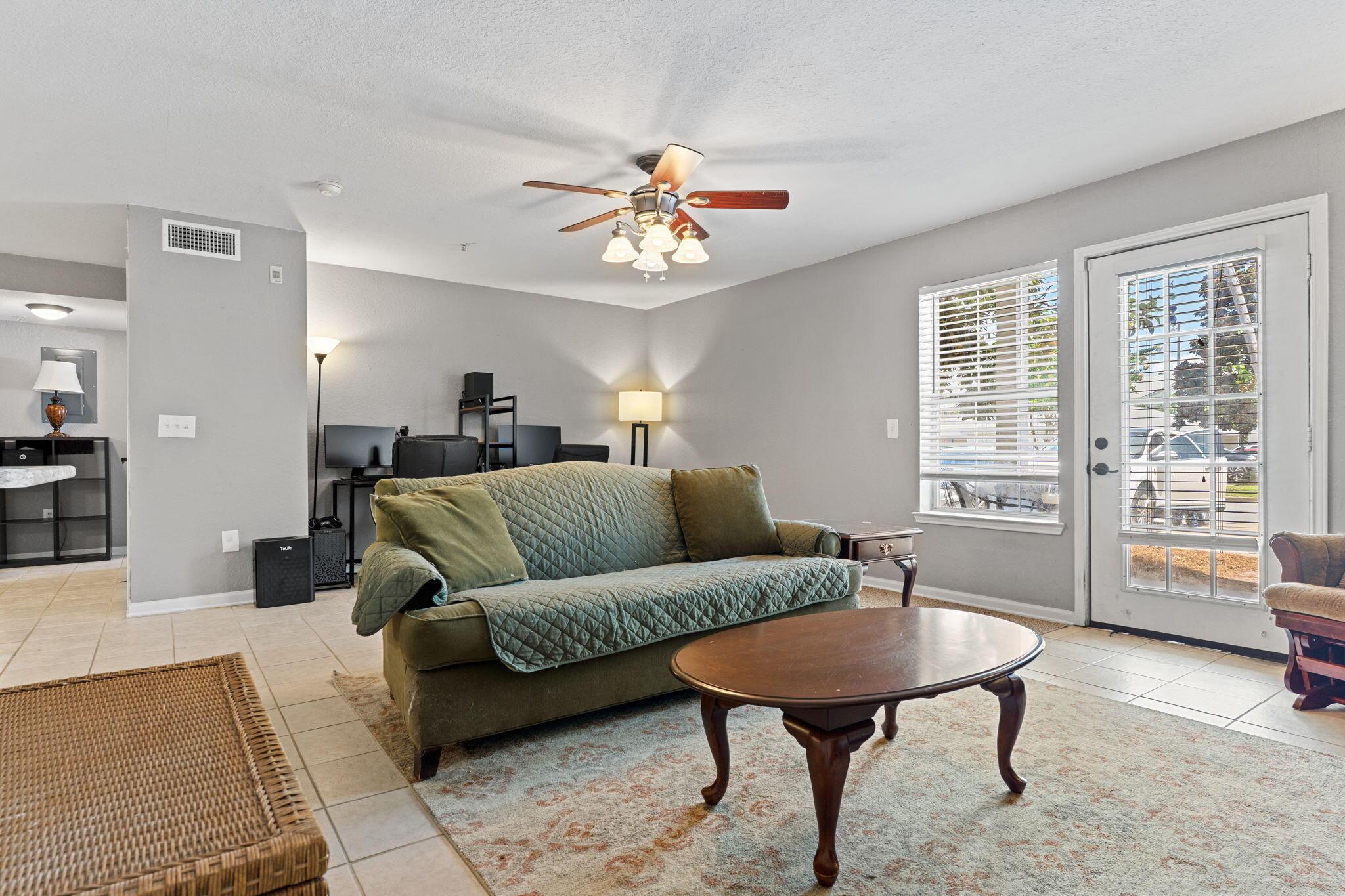 Image 3: Living Area with Natural Lighting