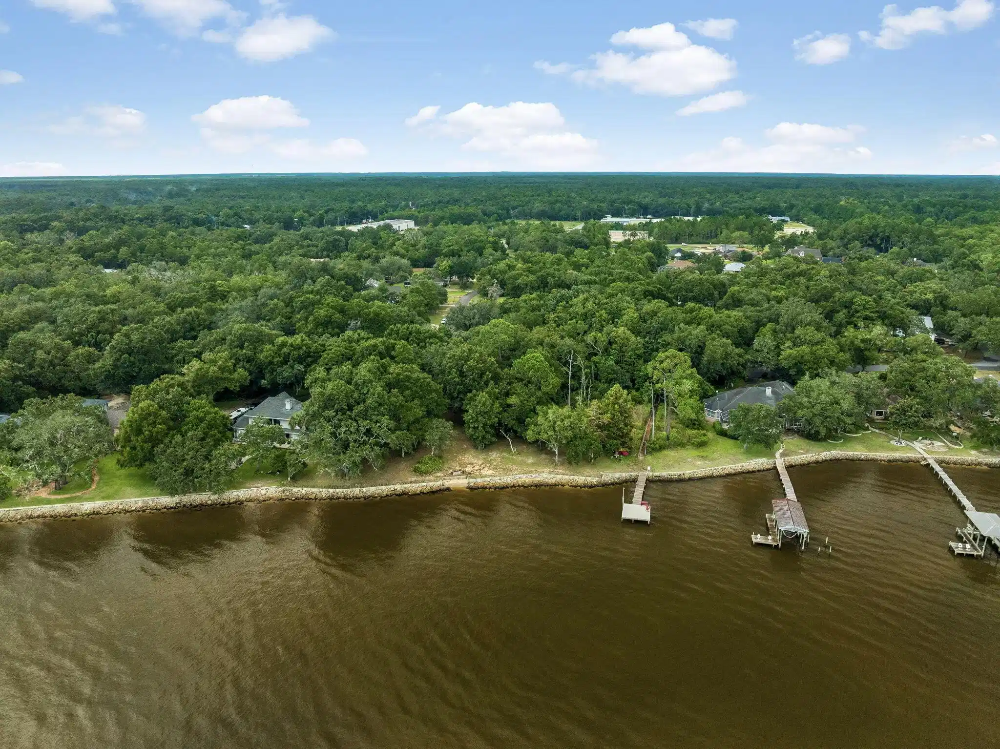 Image 1: 1- Aerial Waterfront Property Overview