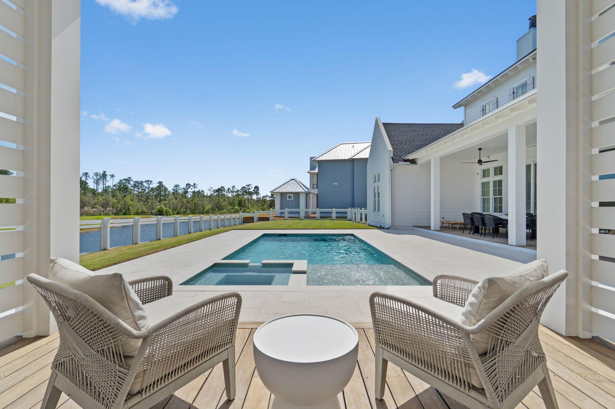Image 1: Pool Overlooks Pond