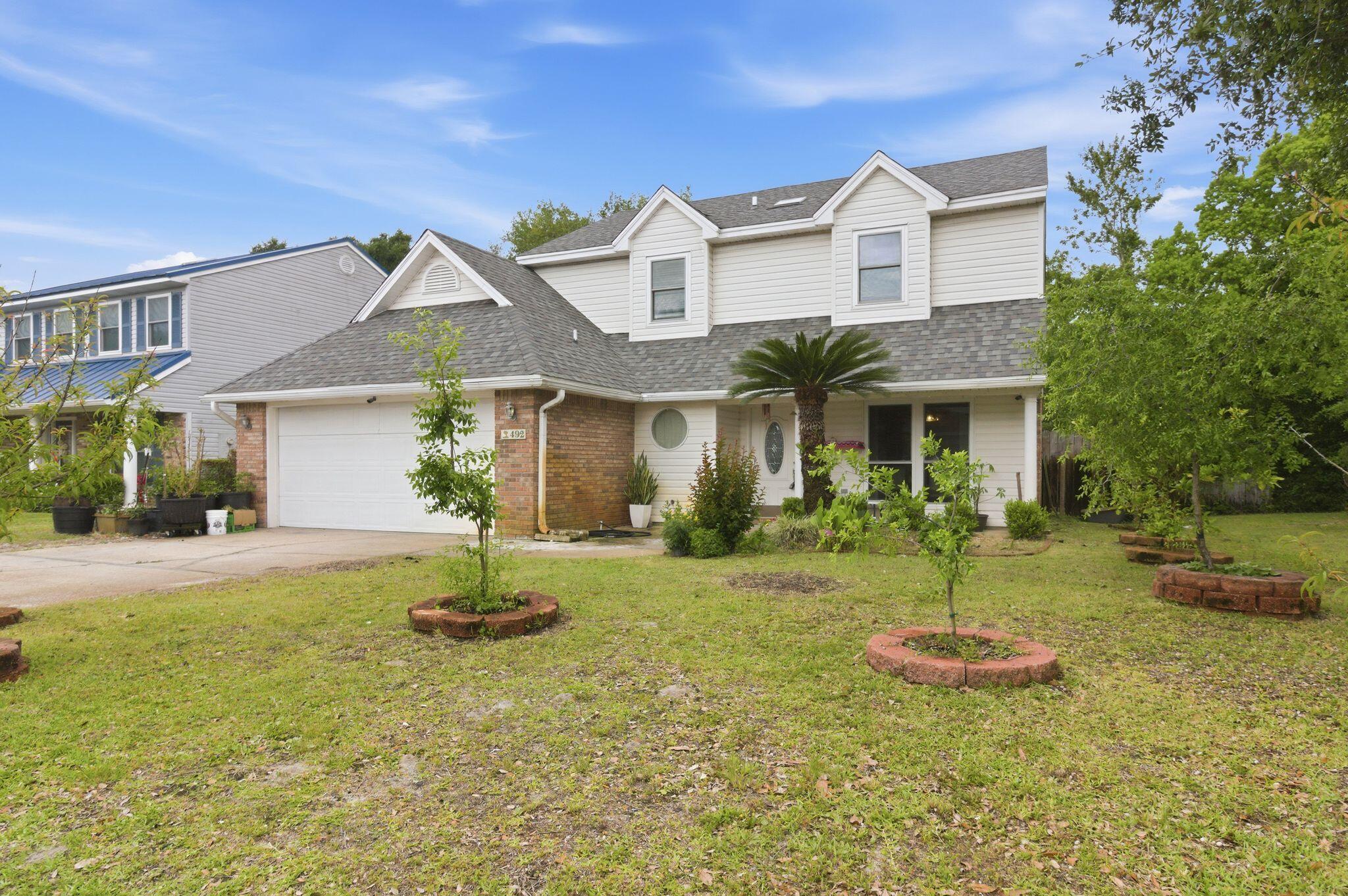 Image 1: Exterior - Front of Home