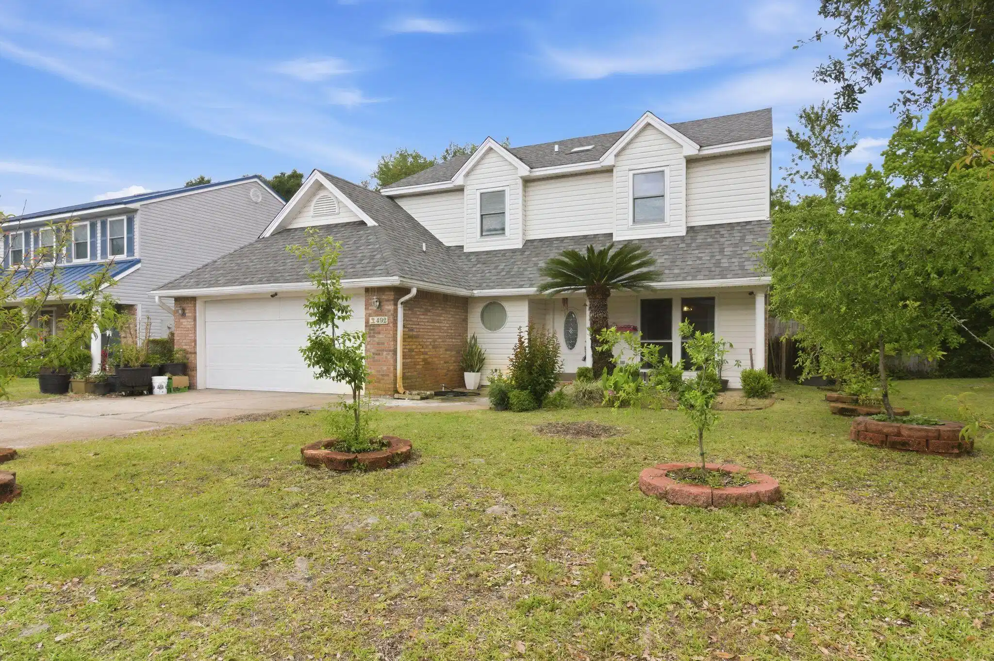 Image 1: Exterior - Front of Home