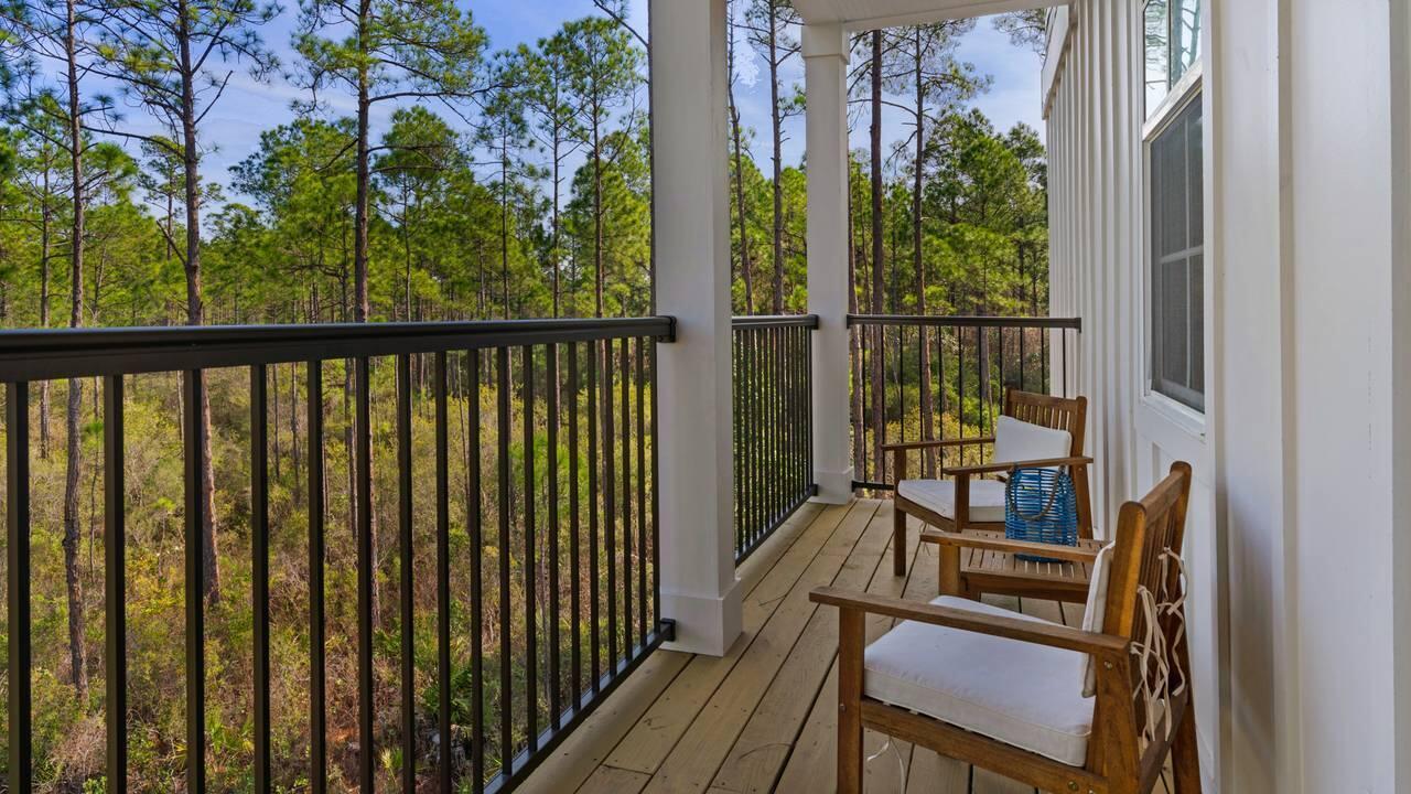 Image 2: outside balcony facing forrest