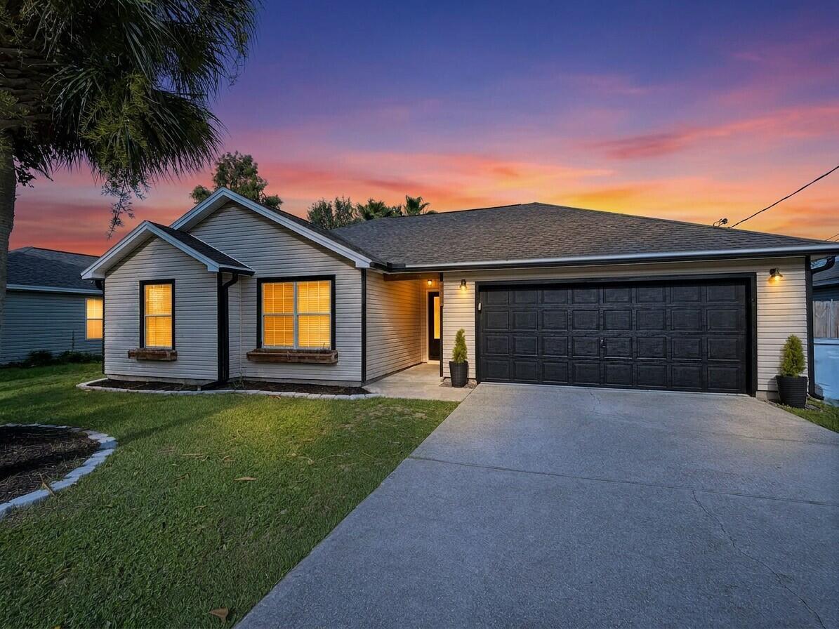 Image 2: 02-exterior_front_of_house_5_twilight