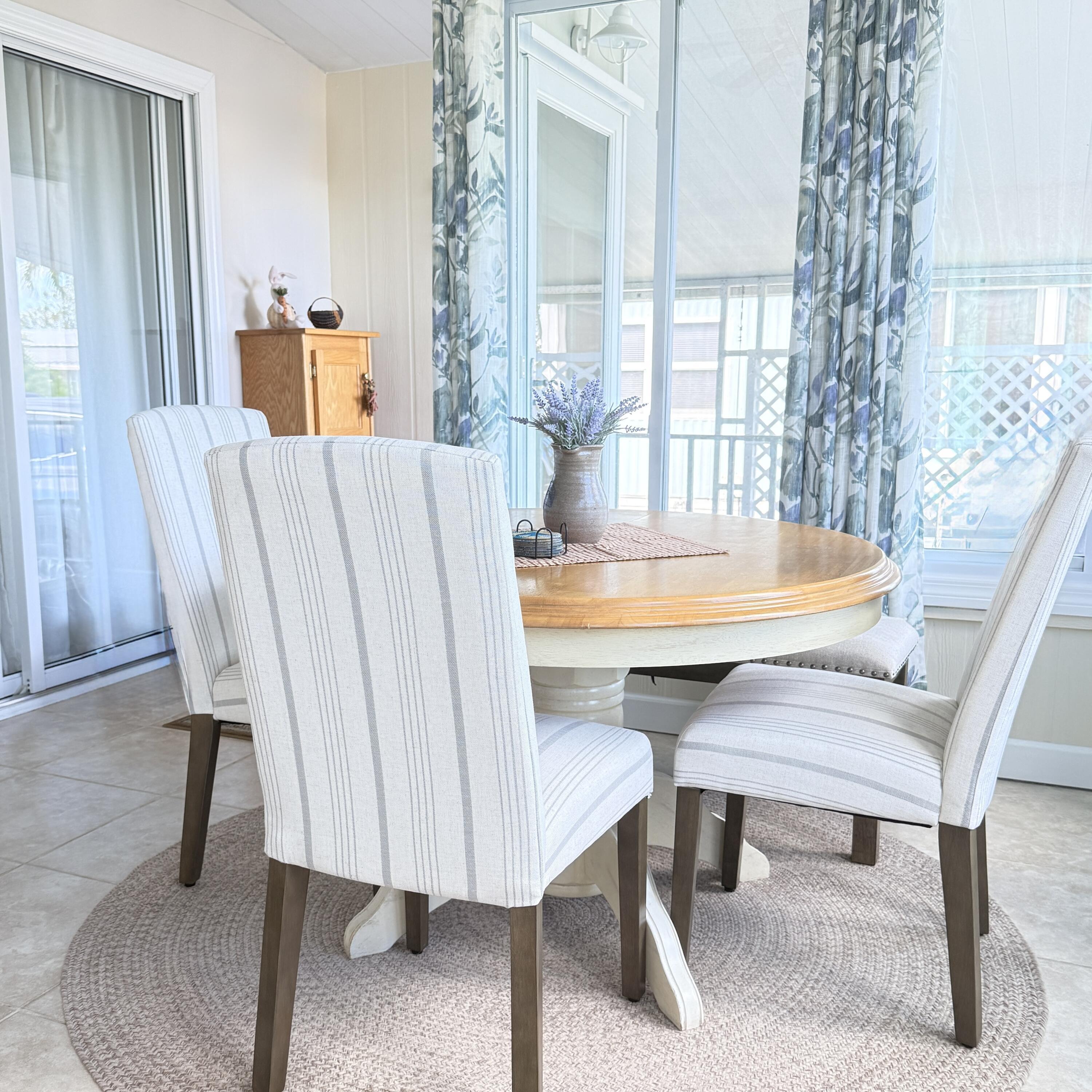 Image 3: DINING AREA IN FRONT SUN ROOM