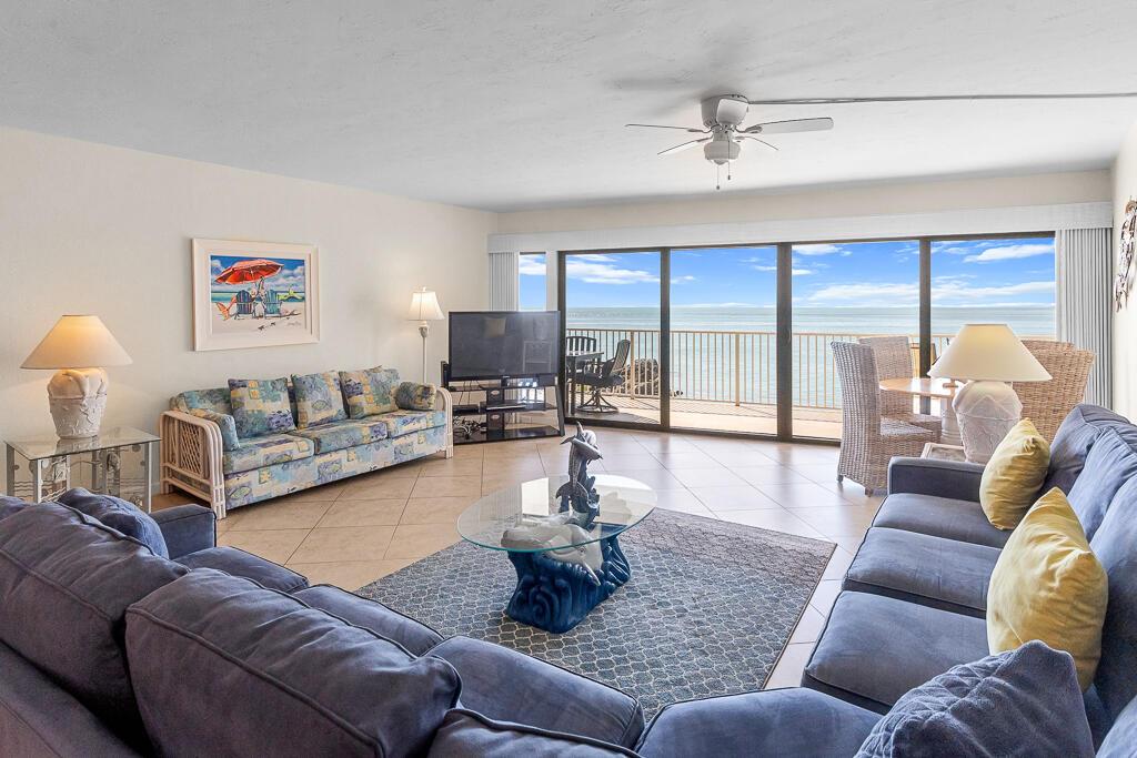 Image 2: Spacious Living Area with Ocean Views
