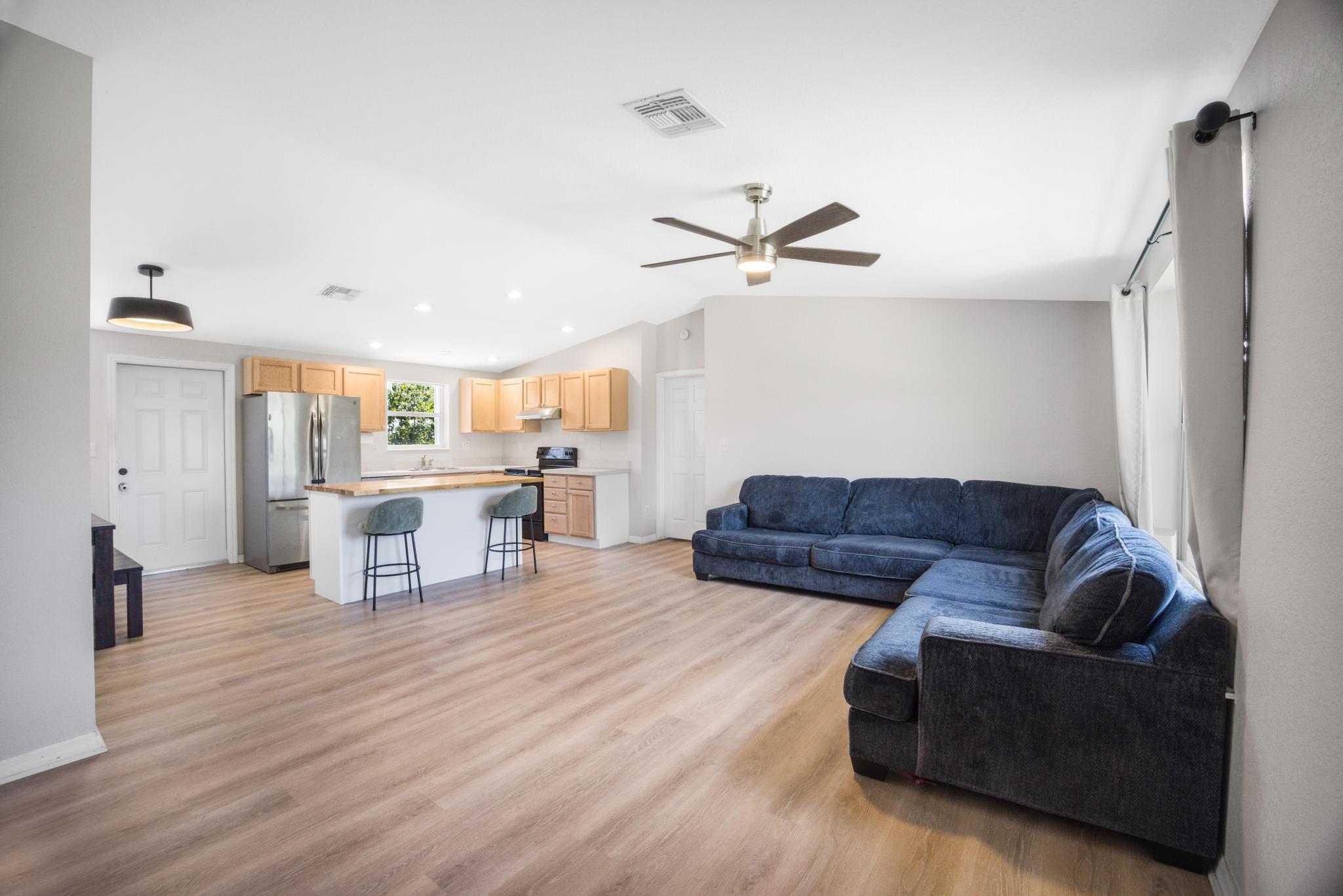 Image 2: Open Living and Kitchen
