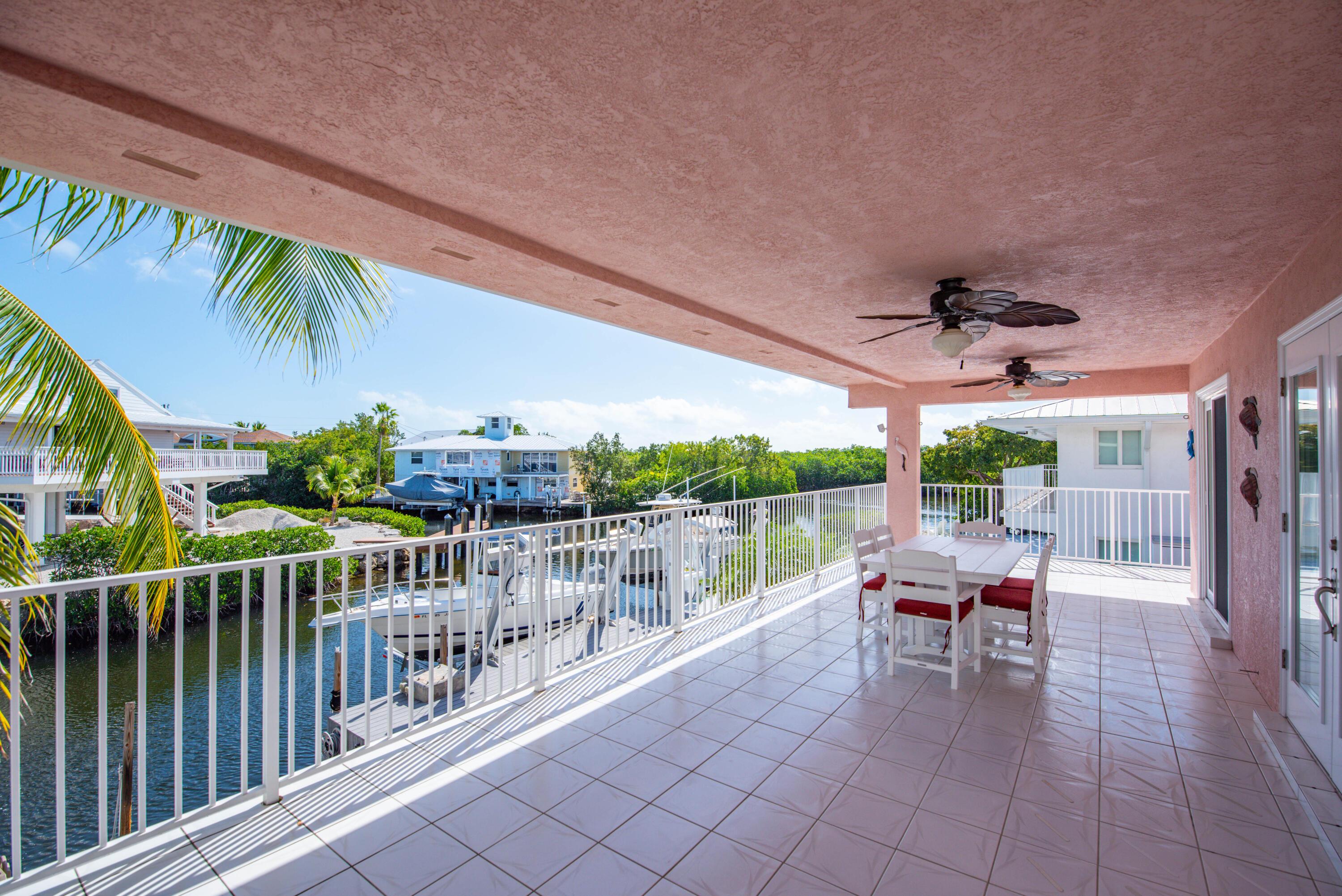 Image 2: large covered deck with a view