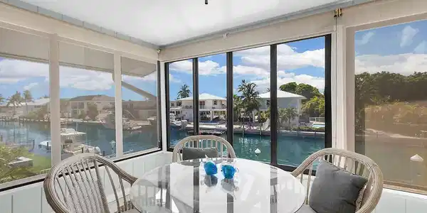 Image 3: Covered porch w/peaceful water views