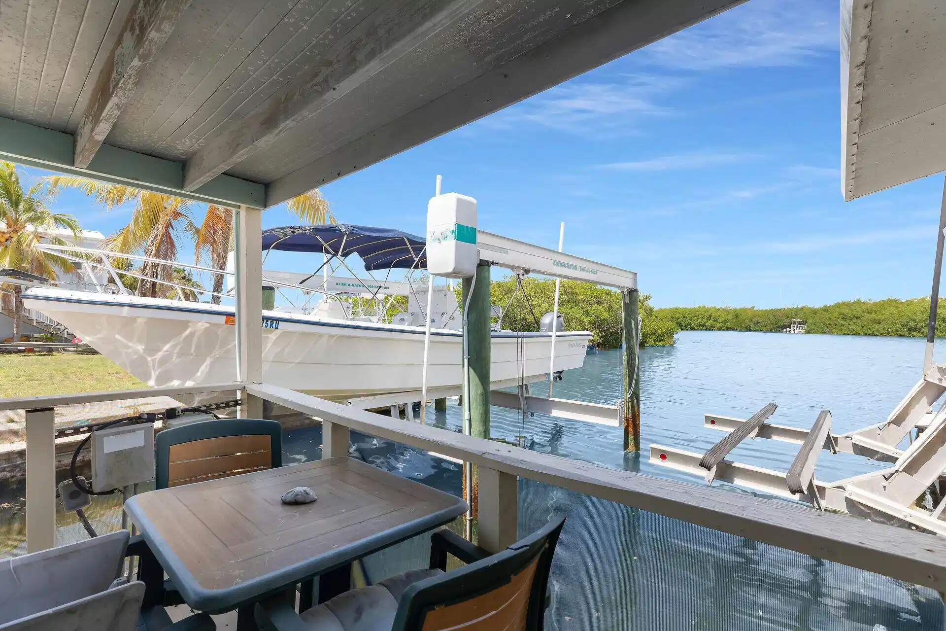 Image 1: boat lift/open water views