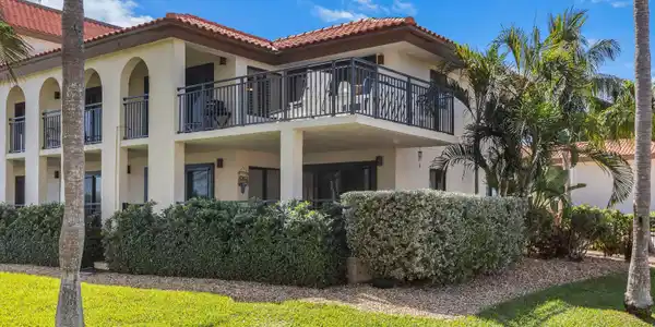 Image 2: 01_Exterior_Condo_Balconies_RedTileRoof_
