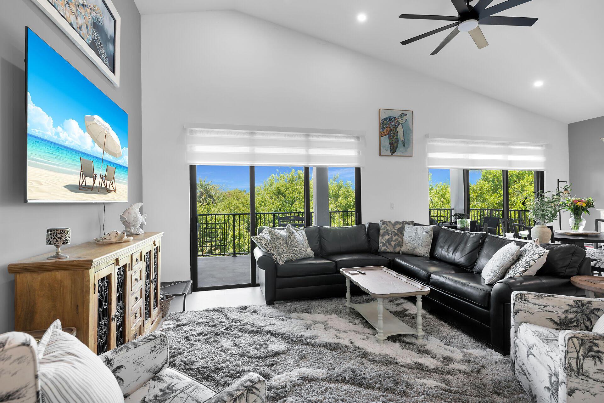 Image 2: LIVING AREA TO 2ND FLOOR BALCONY