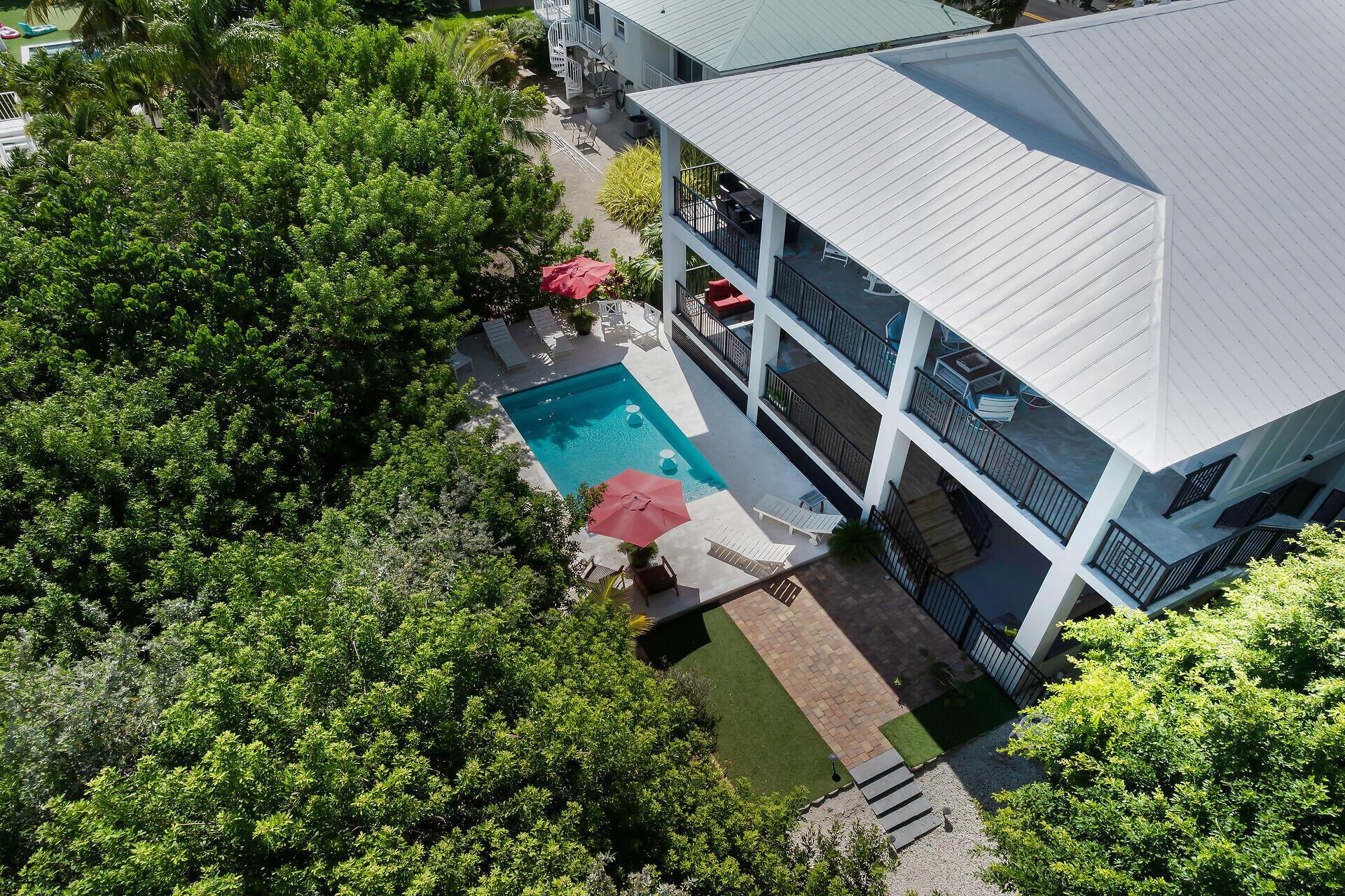 Image 3: AERIAL OF POOL & BACKYARD