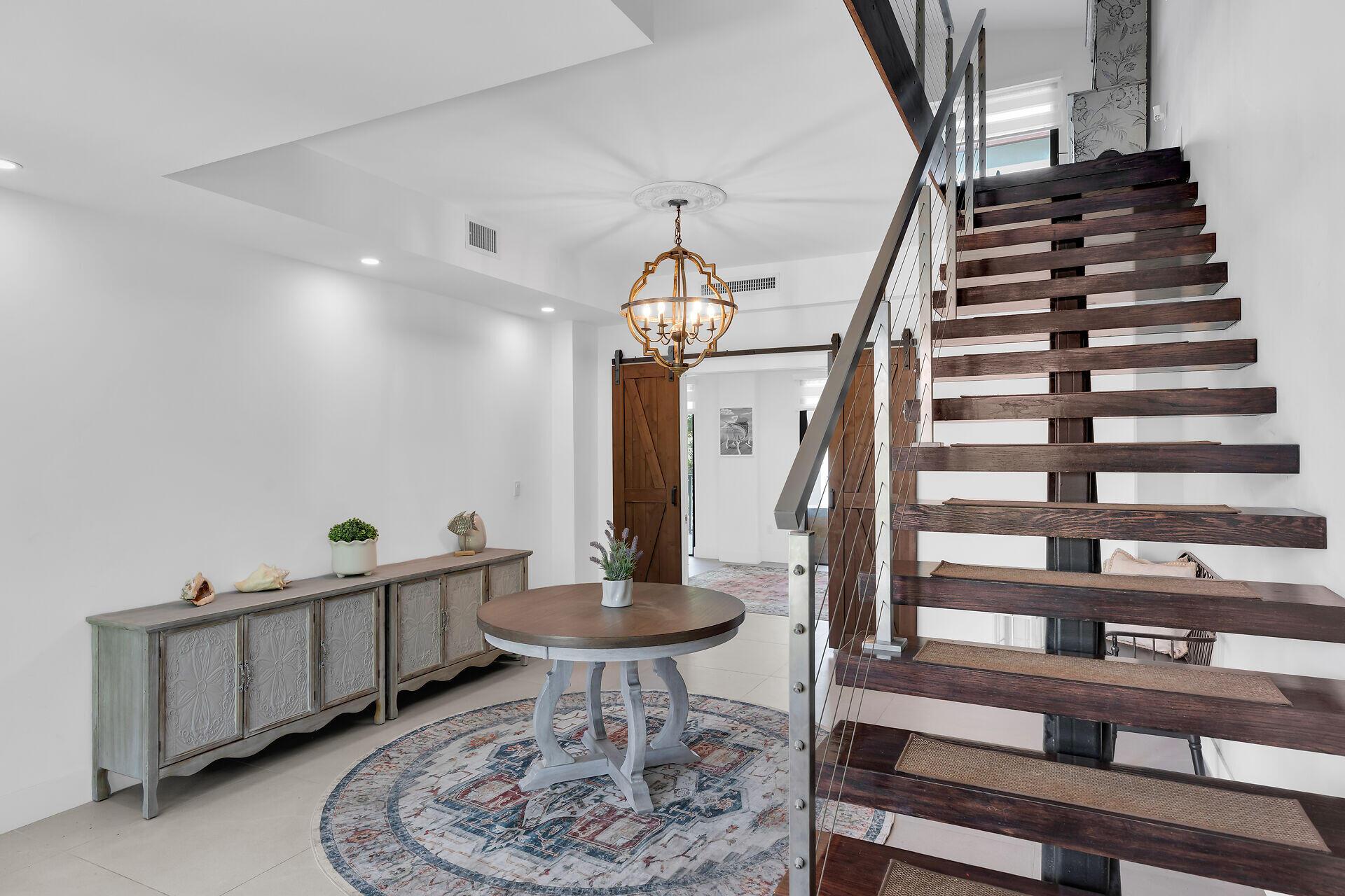 Image 4: FLOATING WOOD STAIRCASE WITH CUSTOM RAIL