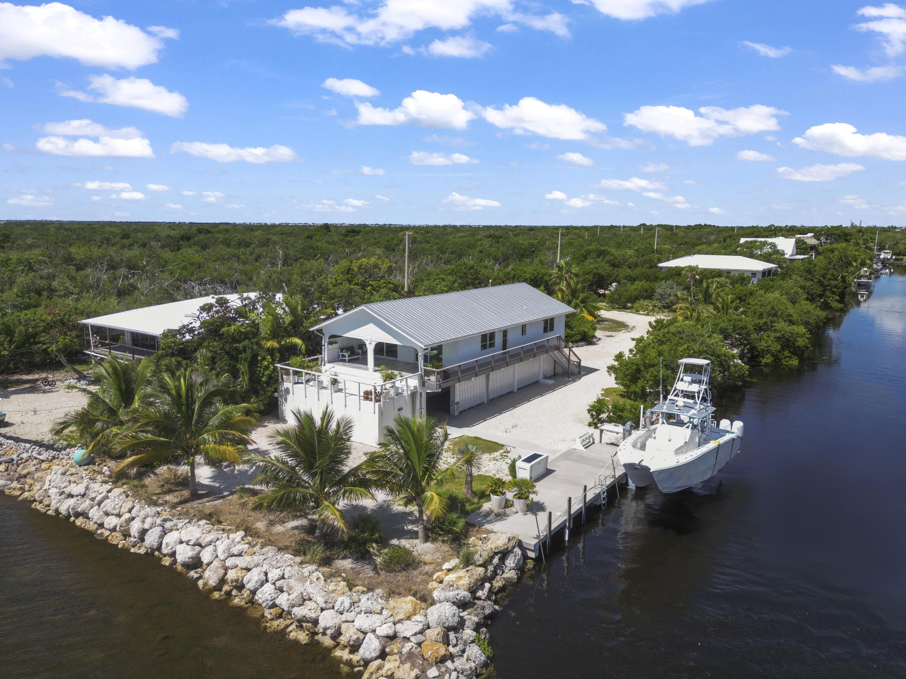 Image 2: ~1 Acre Corner Waterfront Property