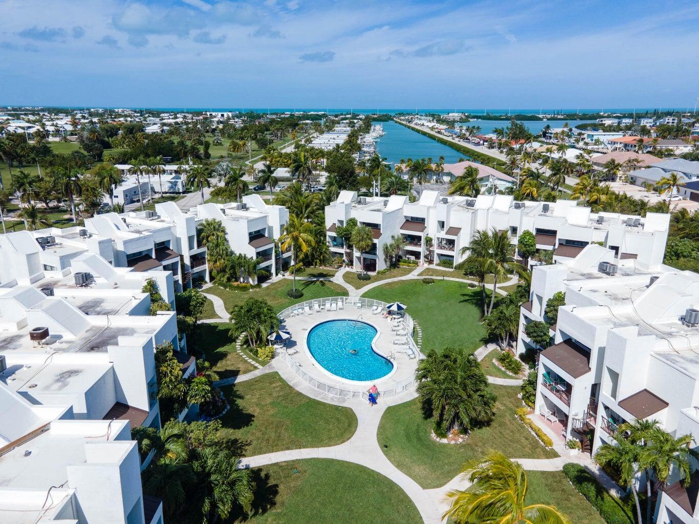 Image 3: Cay 410 Aerial Grounds Pool