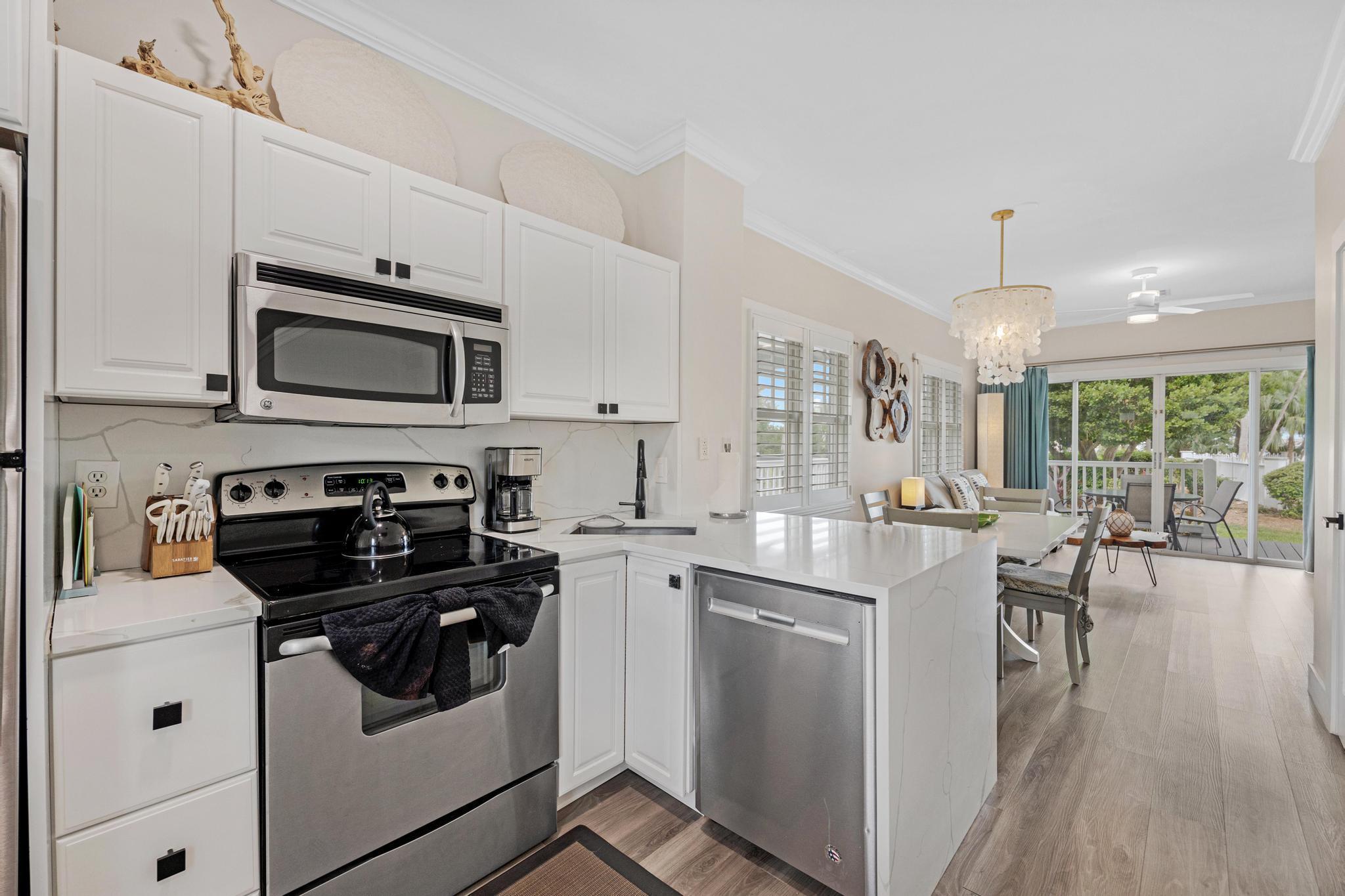 Image 2: Kitchen looking into living area