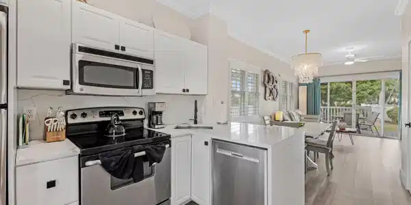 Image 2: Kitchen looking into living area