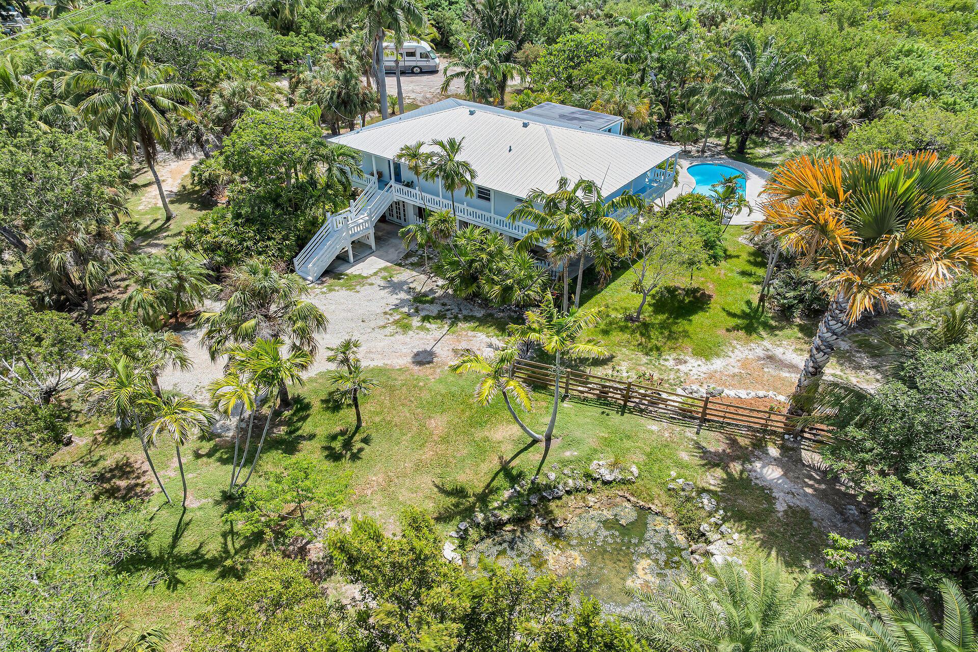 Image 1: Aerial of Home / Pool / Pond