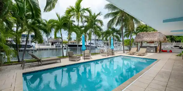 Image 2: Large pool and tiki