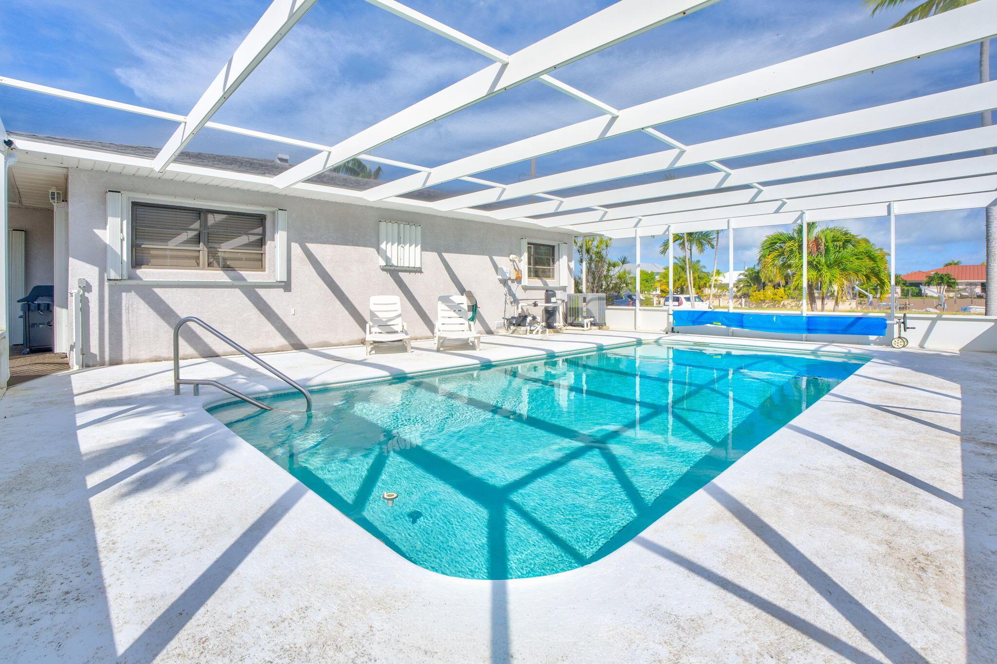 Image 2: Screened Lanai with Pool