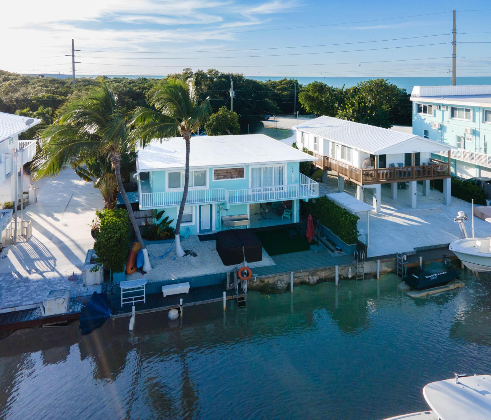 Image 2: 111225 Rego 105 Long Key Lake Rd. SIZED