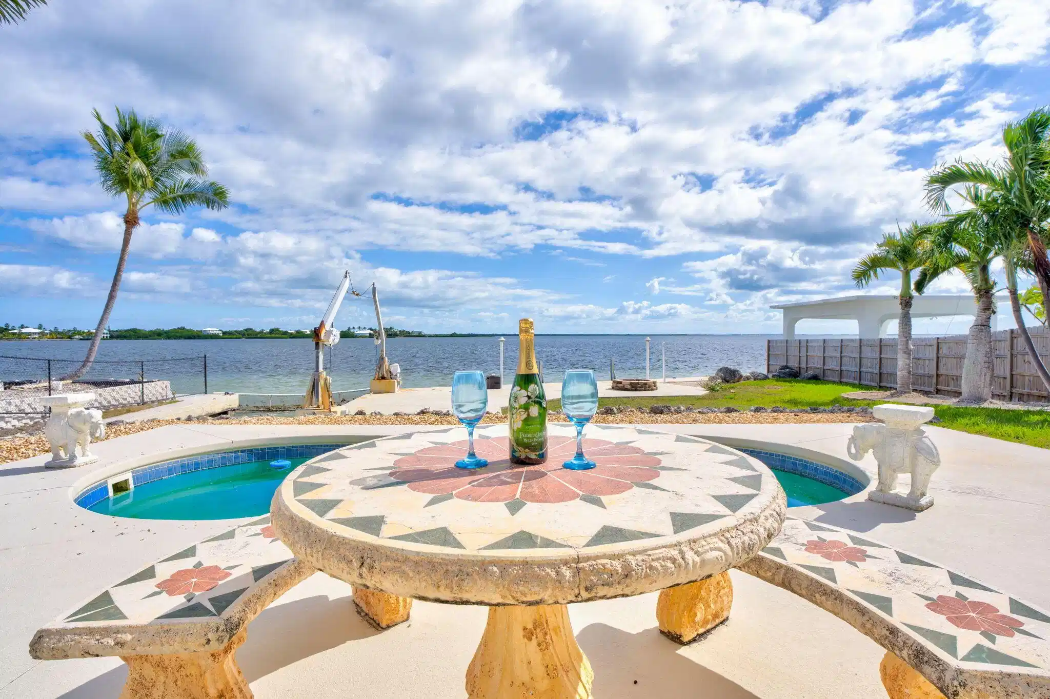 Image 1: Pool and Open Water View