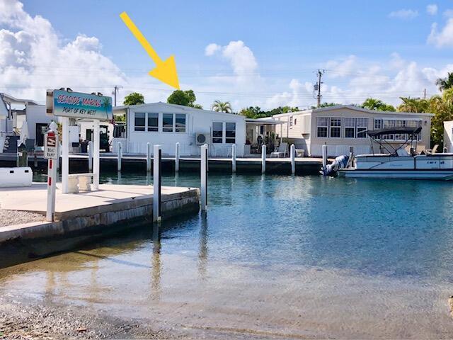 Image 3: Home with arrow