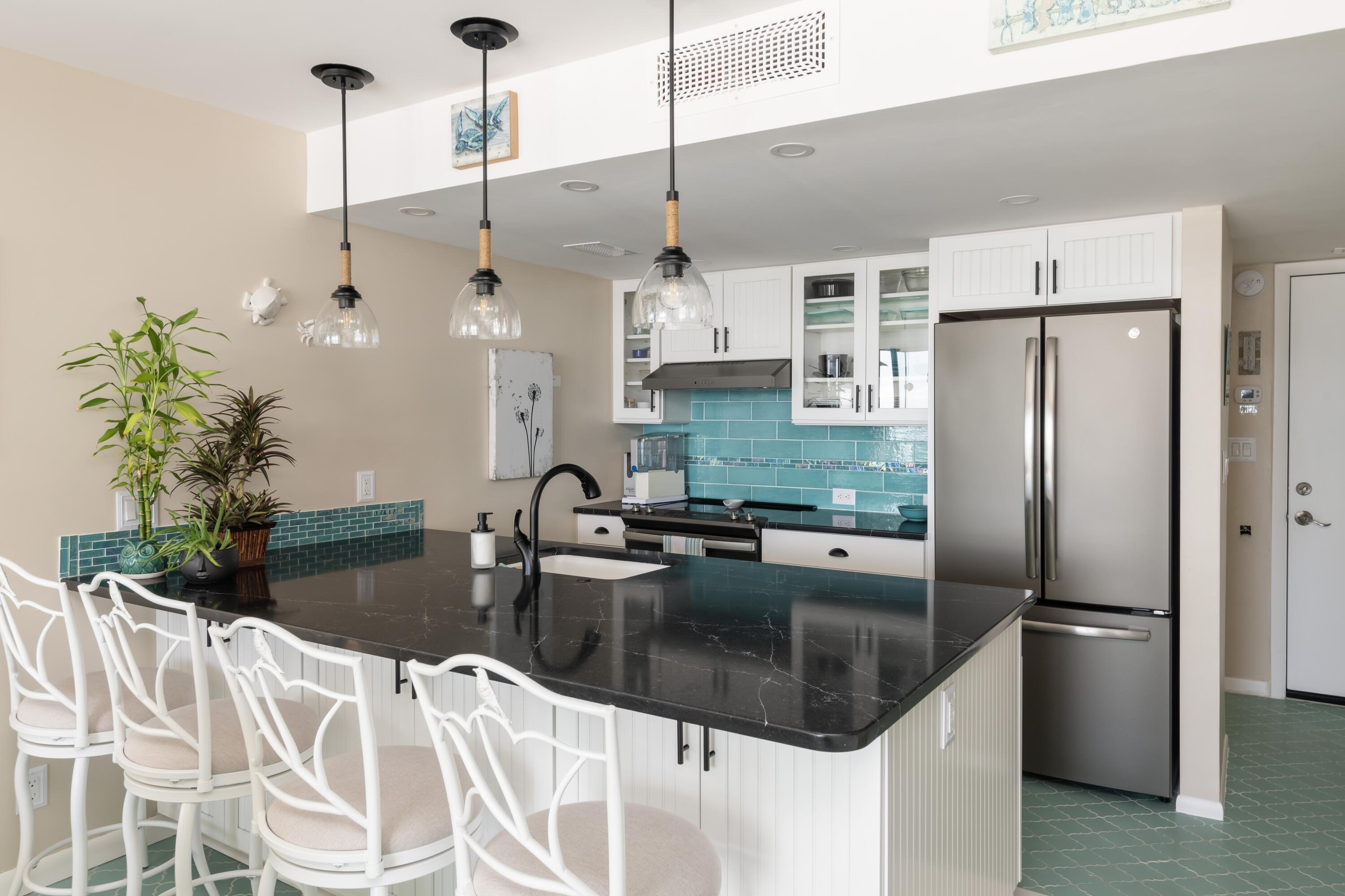 Image 4: 133_Coco_Plum_Drive_35_Interior_Kitchen_