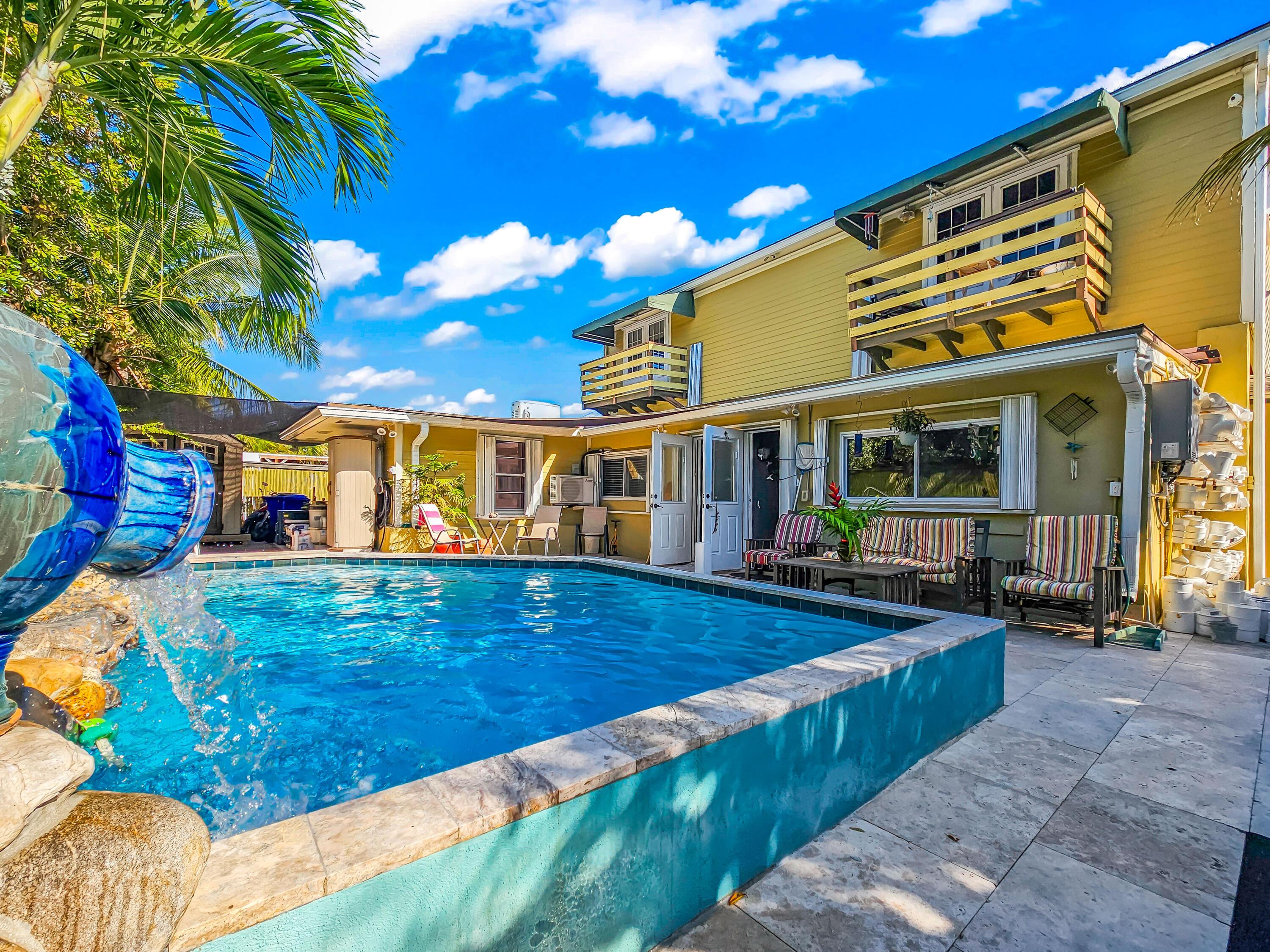 Image 4: Backyard Pool Lounge Area (6)