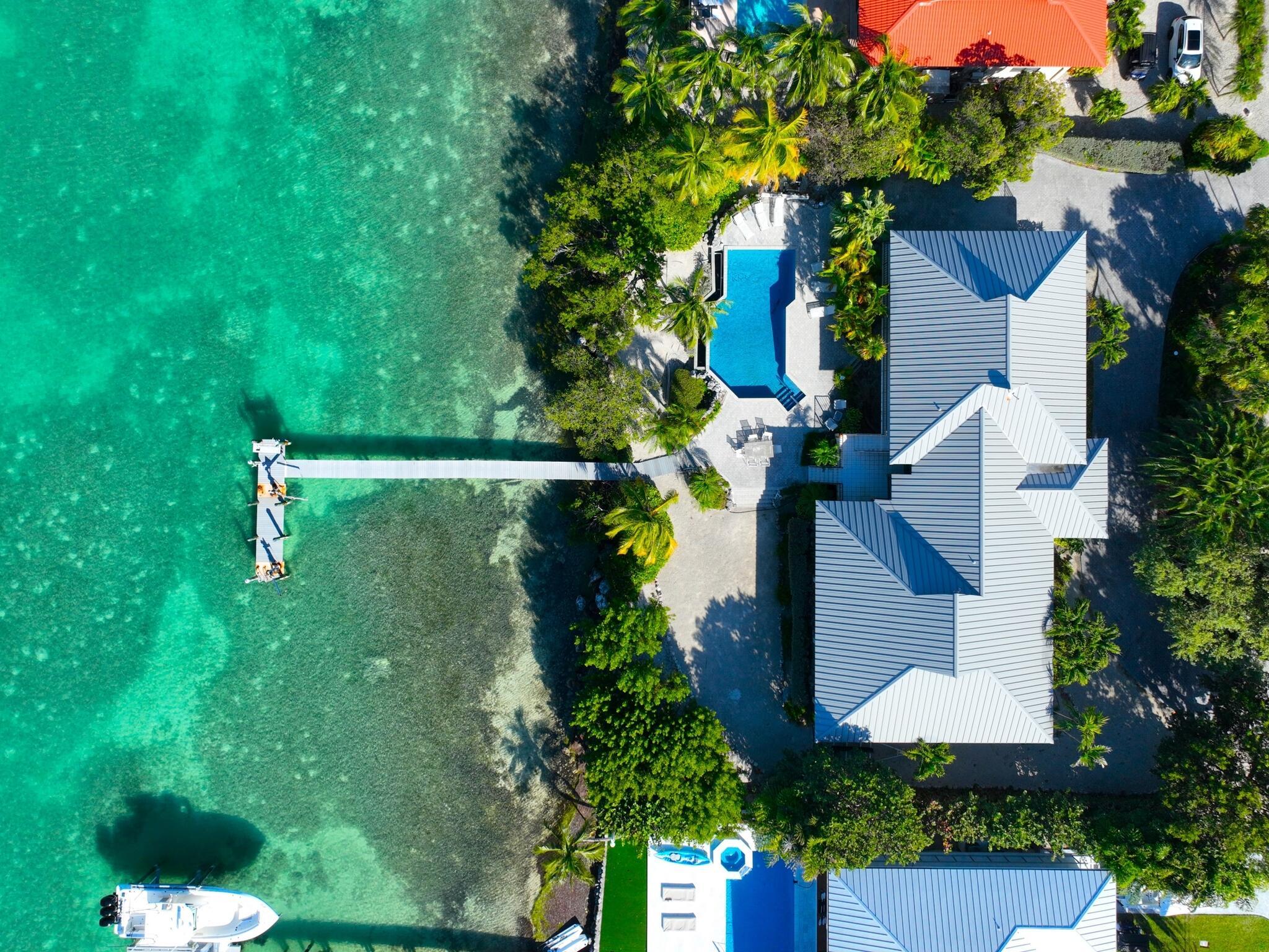 Image 4: 112-Bimini-Drive-aerial-dock