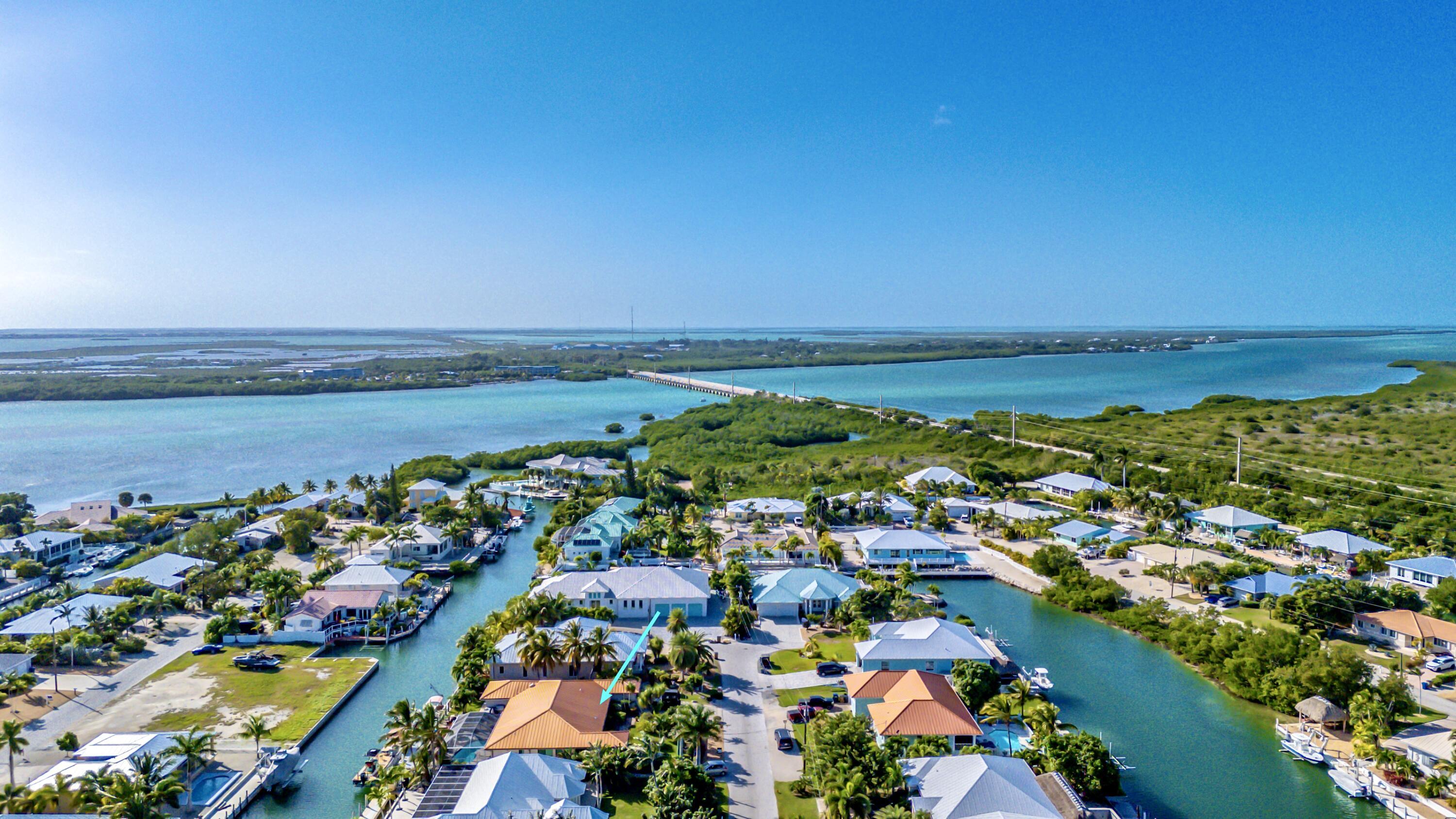 Image 2: Canal Front Home with Covered Pool (10)