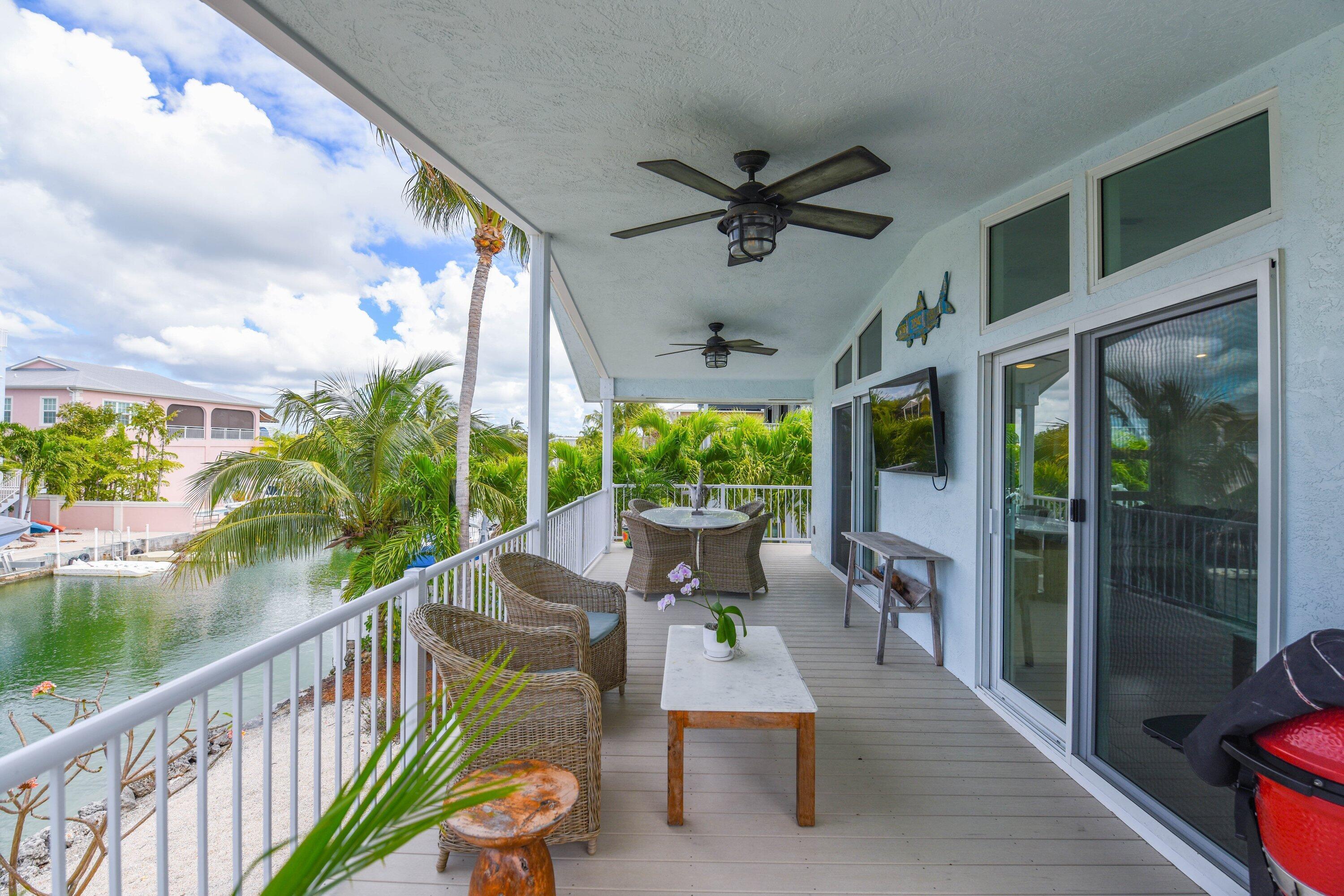 Image 2: 031-637Carib-SummerlandKey-porch