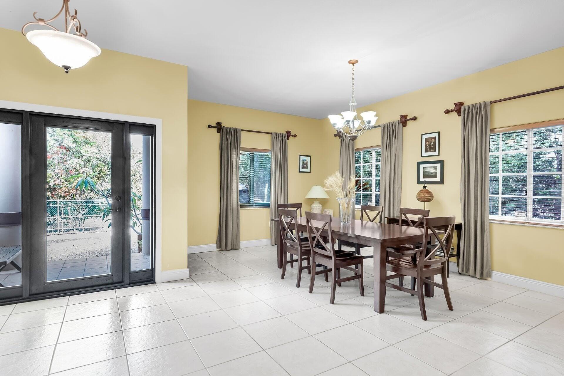 Image 3: Foyer and Formal Dining Room