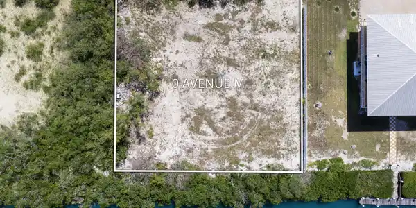 Image 2: Marathon_Vacant_Lot_0_AVENUE_M_0082_With