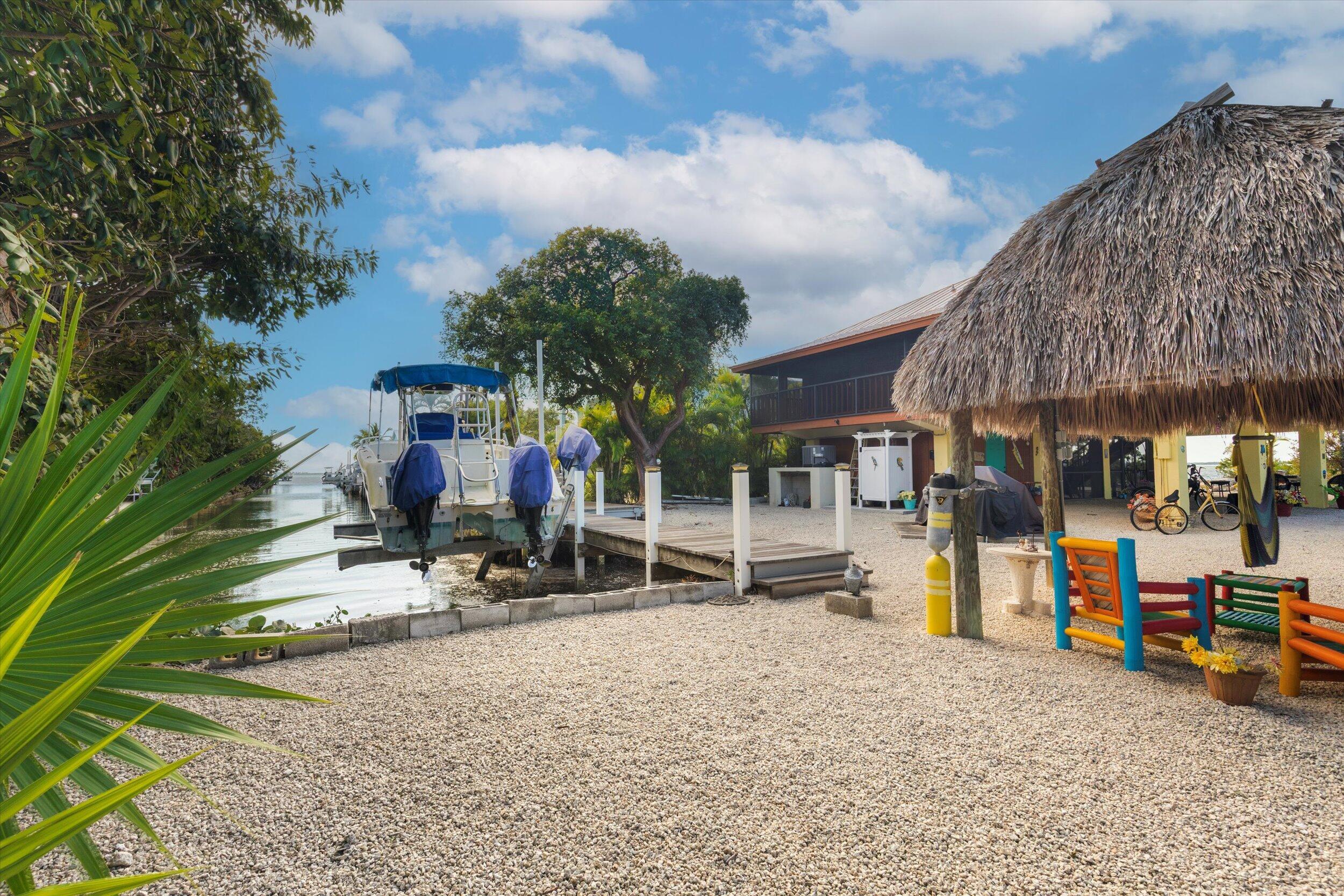 Image 3: Tiki Looking Down Canal