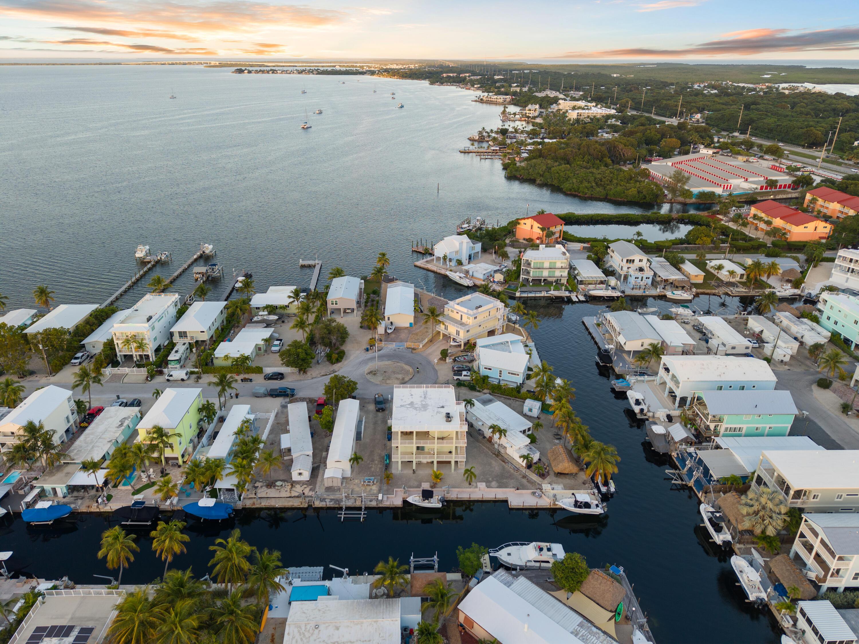 Image 3: Aerial of Home overlooking the Bay