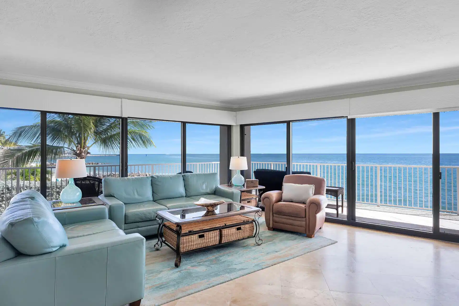 Image 1: Living Room with Floor to Ceiling Views