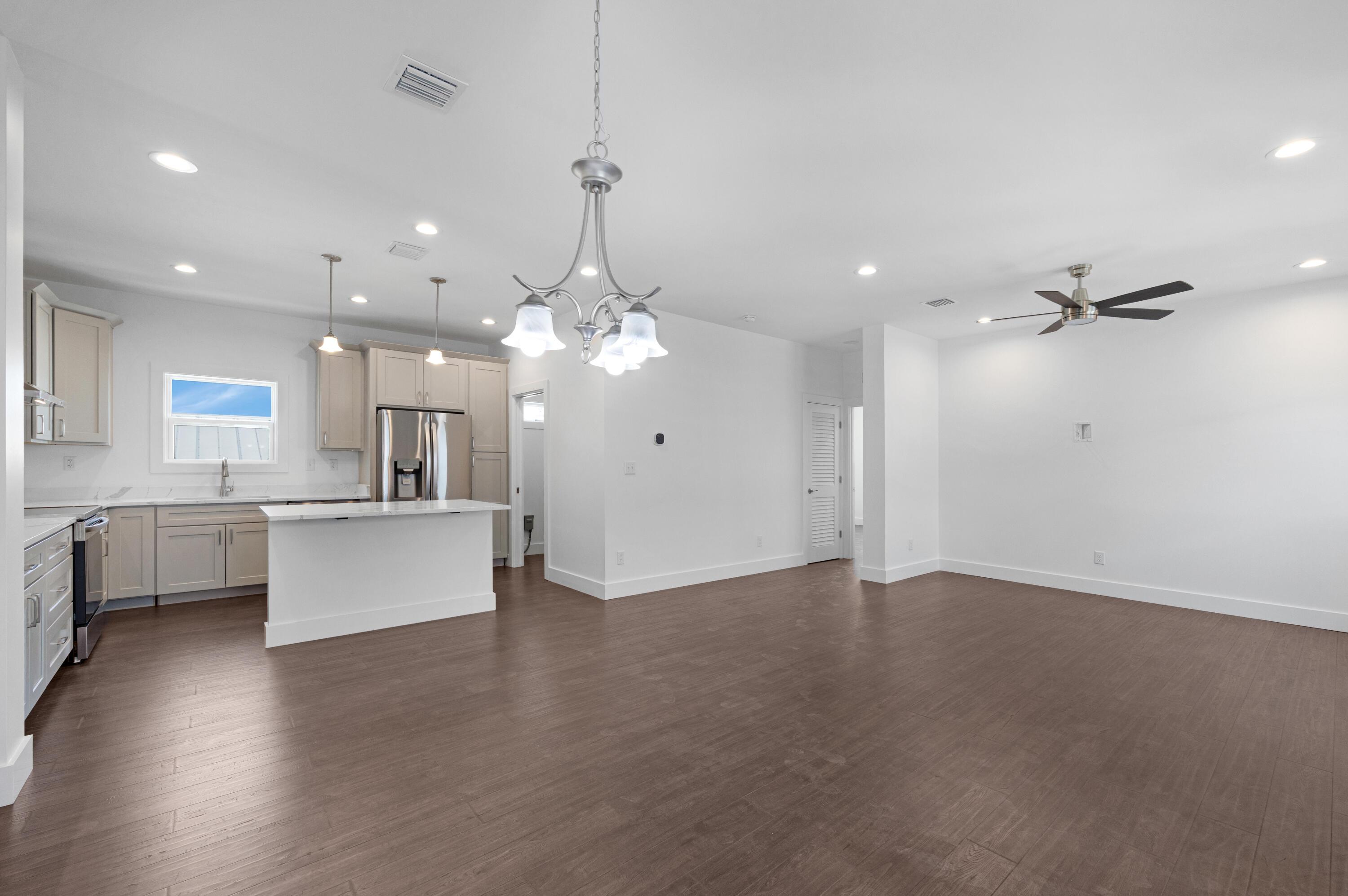 Image 3: Open Living and Kitchen Flow