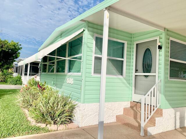 Image 3: FRONT ENTRANCE TO HOME.