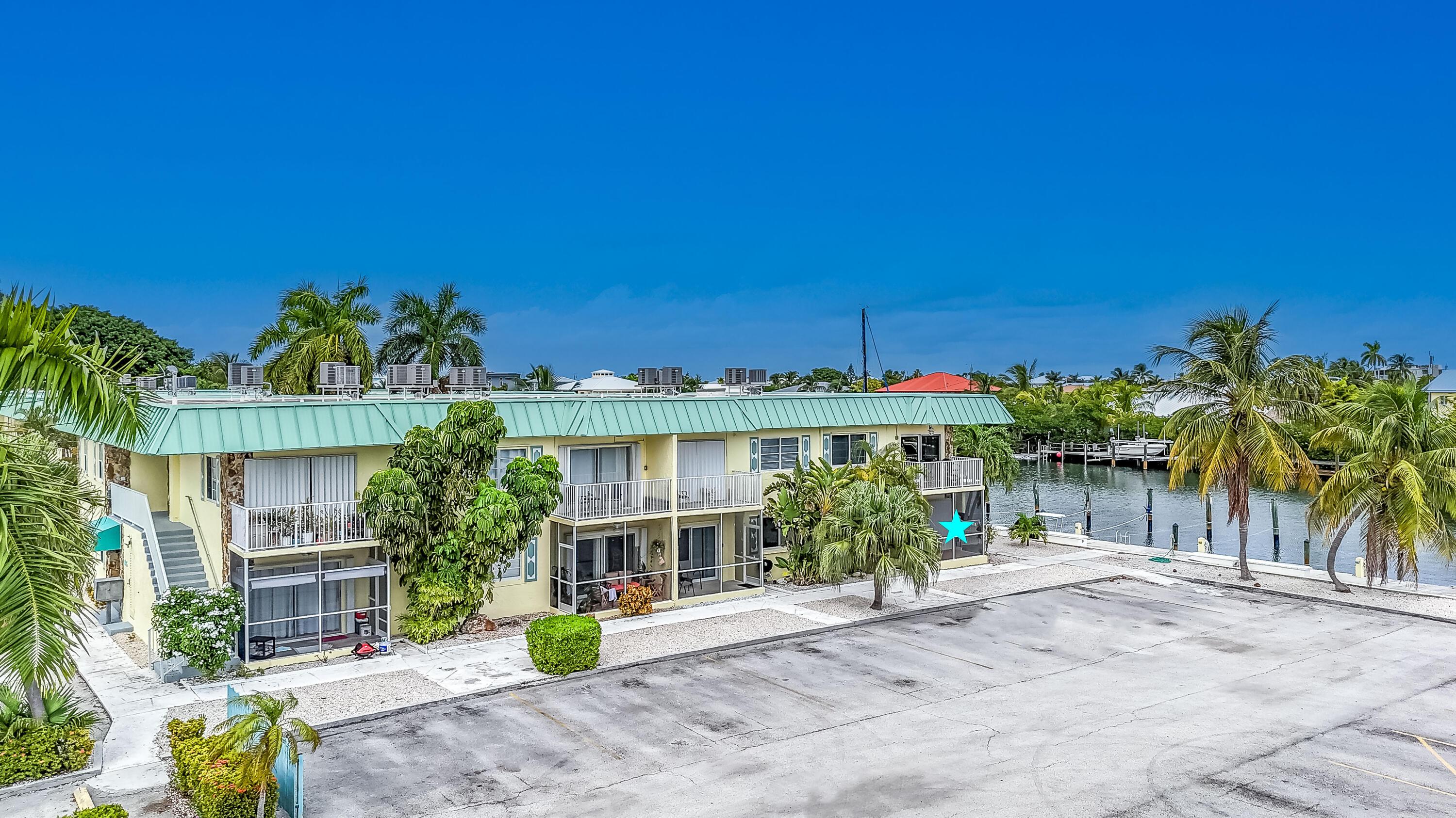 Image 1: Condo with marina and pool (1 of 20)