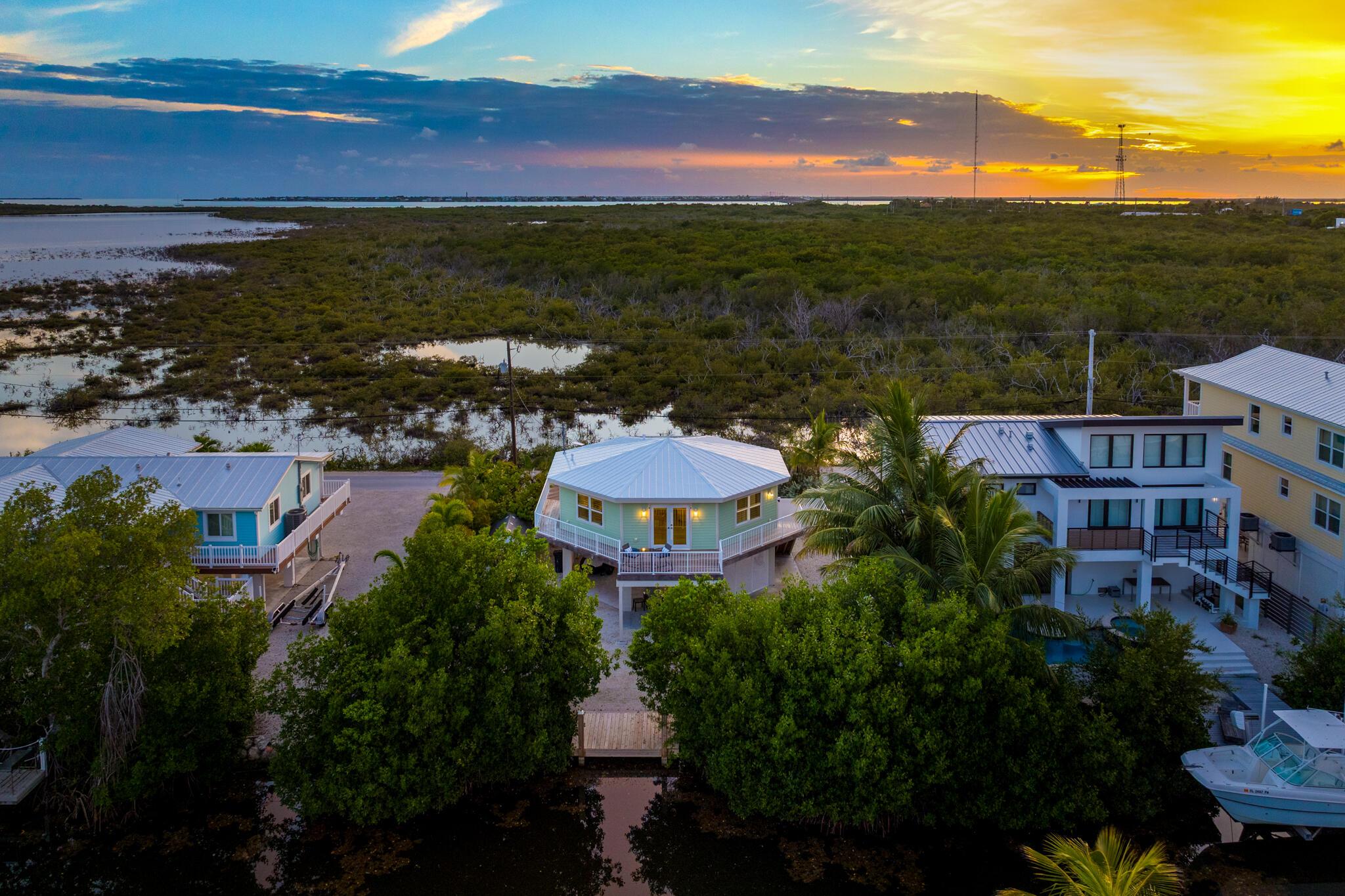 Image 1: Sunset Aerial w/ Views of Salt Ponds