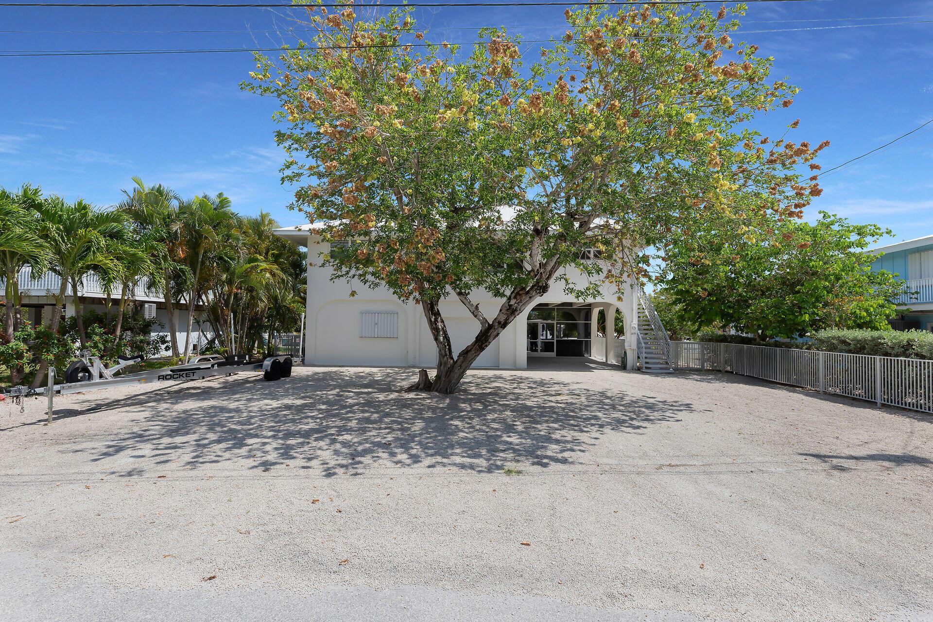 Image 4: Front Yard - covered parkin